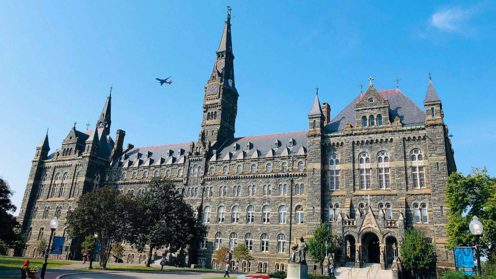 Georgetown With Plane Flying Wallpaper