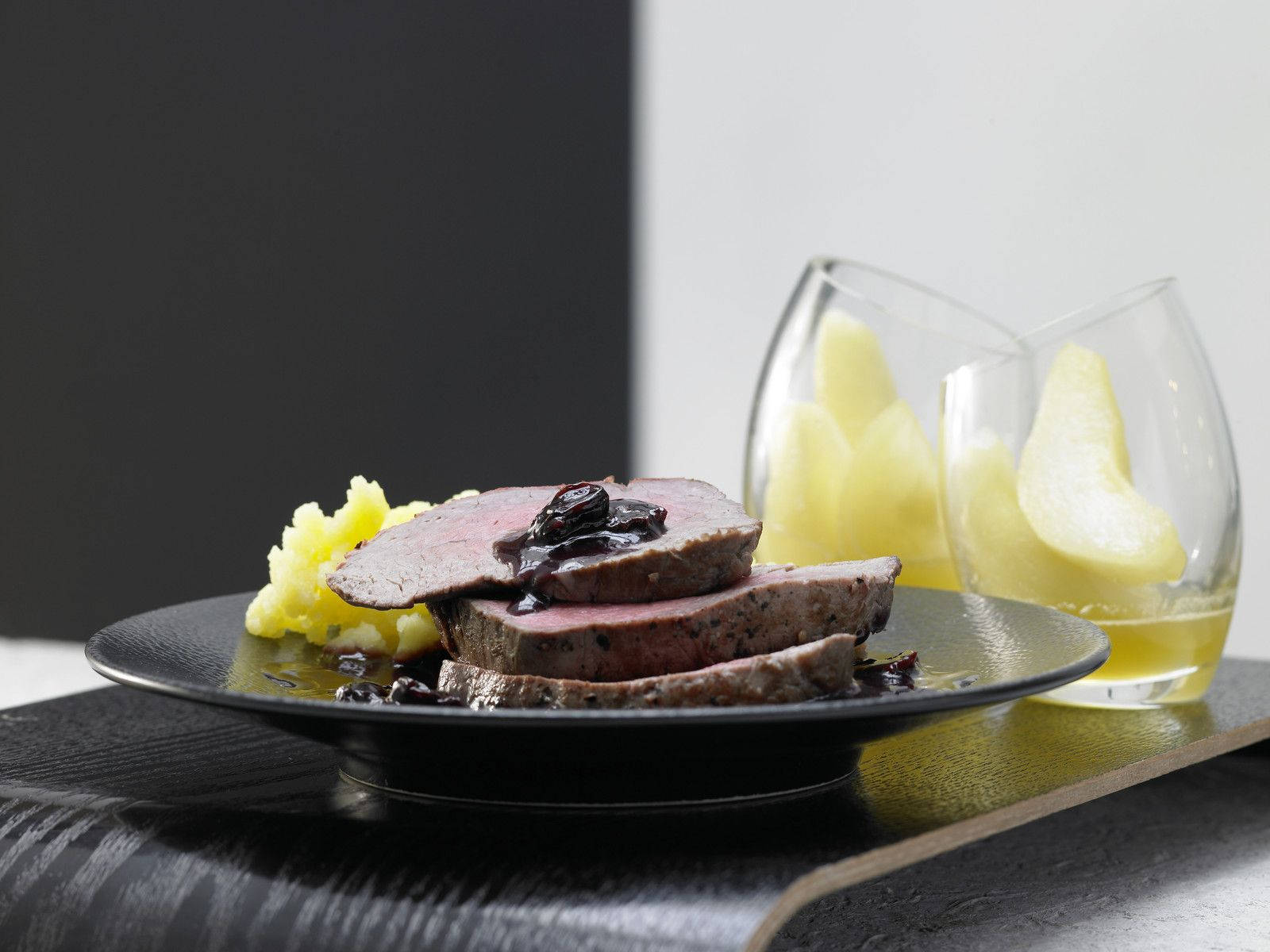 German Sauerbraten Delicacy With Sliced Pear Wallpaper