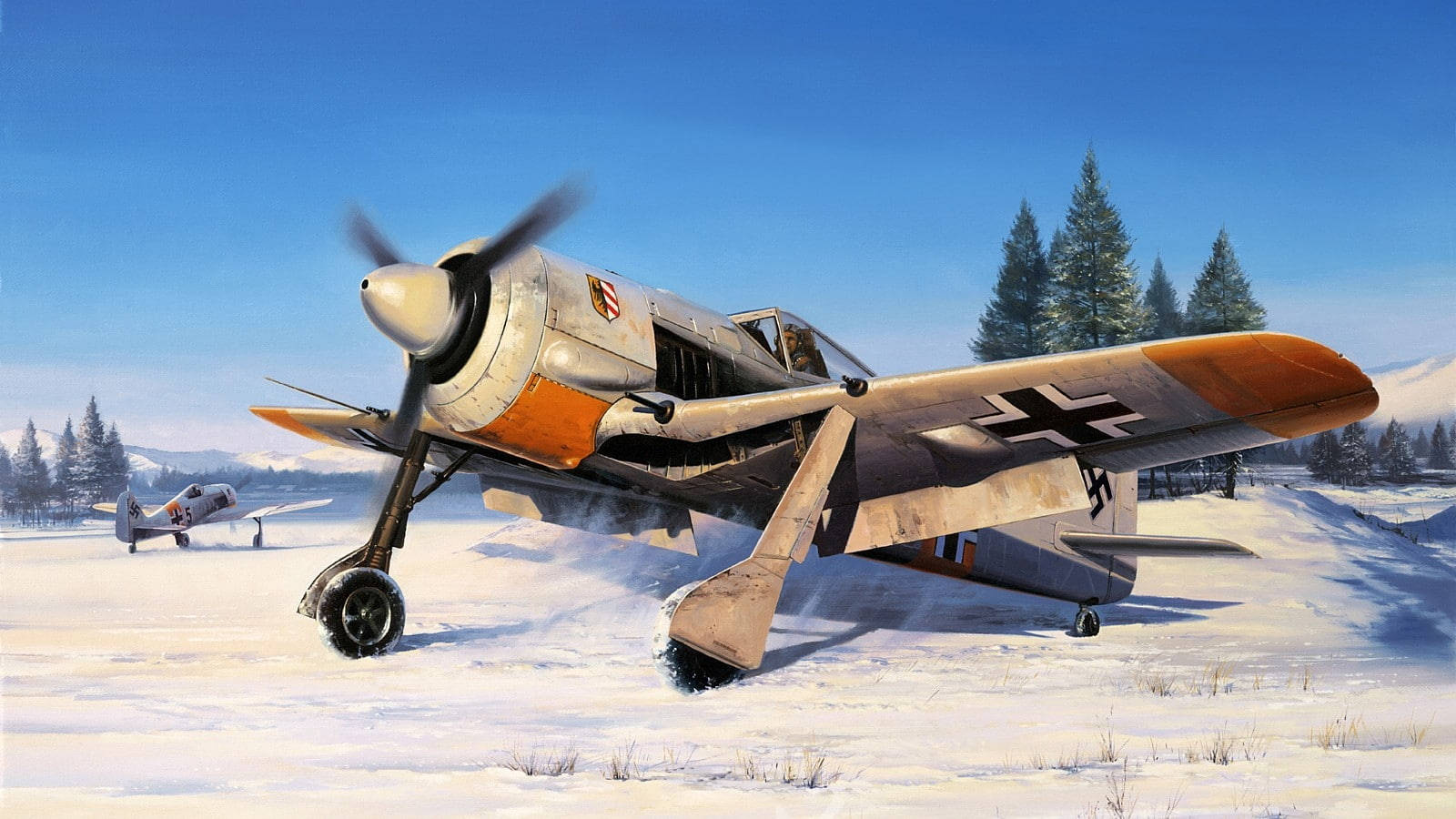 German Ww2 Fighters On Snowy Ground Wallpaper