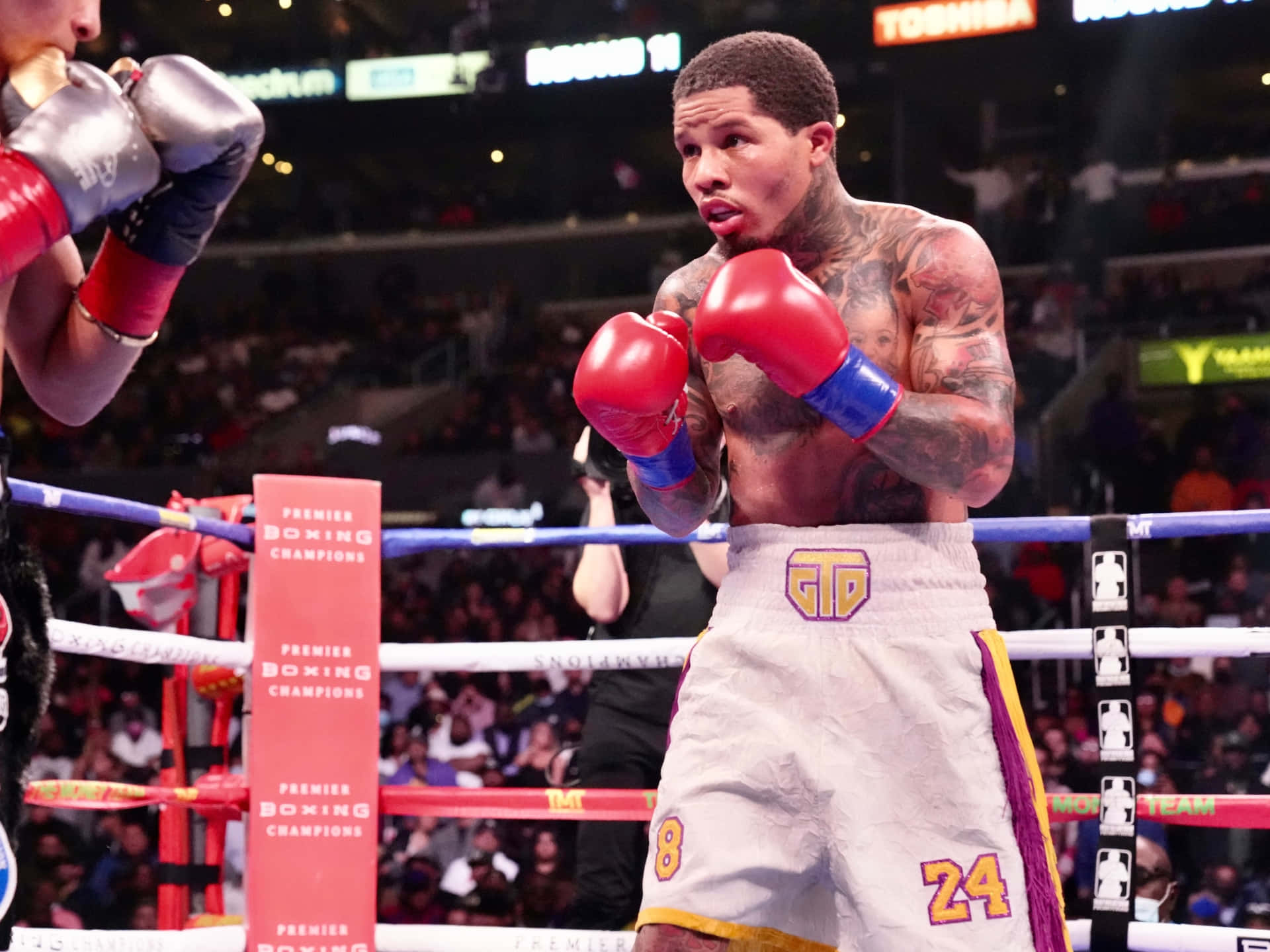 American professional boxer Gervonta Davis challenges opponents in the ring Wallpaper
