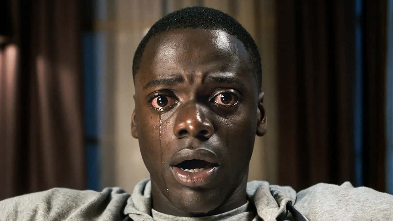 Get Out Film Tårevått Uttrykk Bakgrunnsbildet