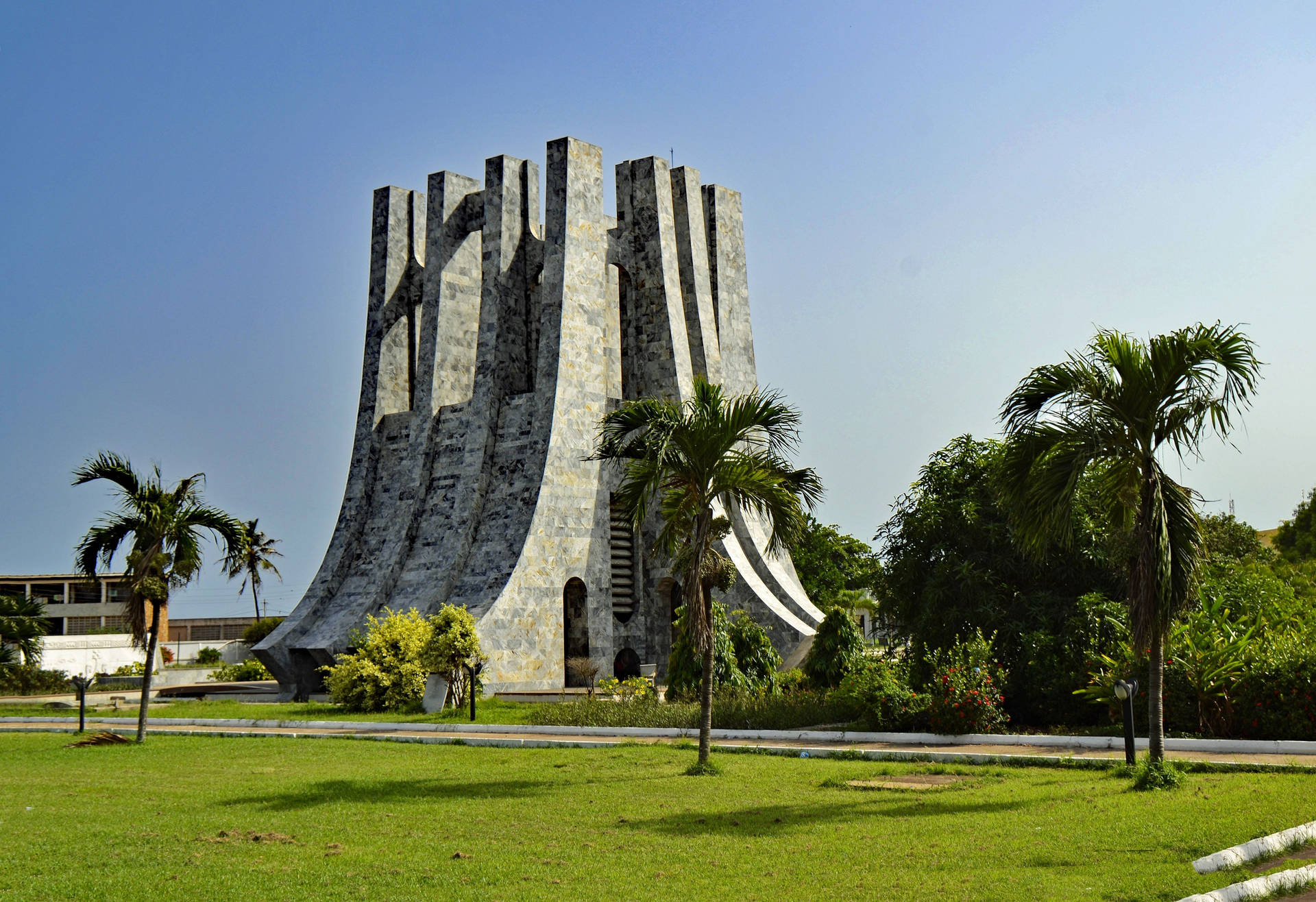 Det Ghana Kwame Nkrumah Monument på en tyrkis baggrund. Wallpaper