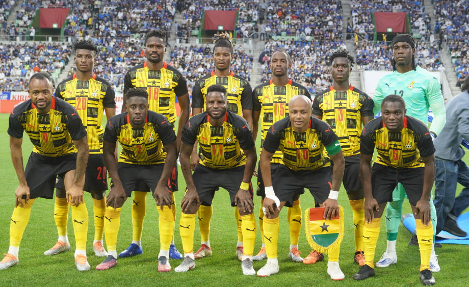 Ghana National Football Team In Yellow Background