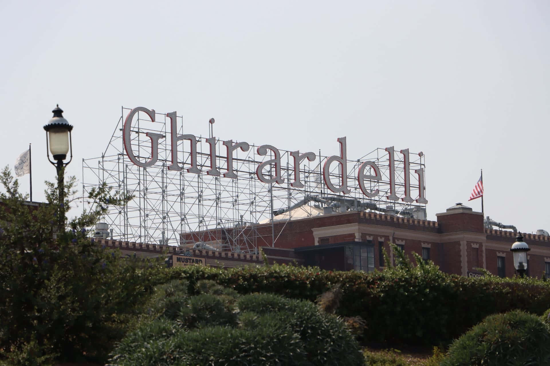Ghiradelli Square Sign From The Garden Wallpaper