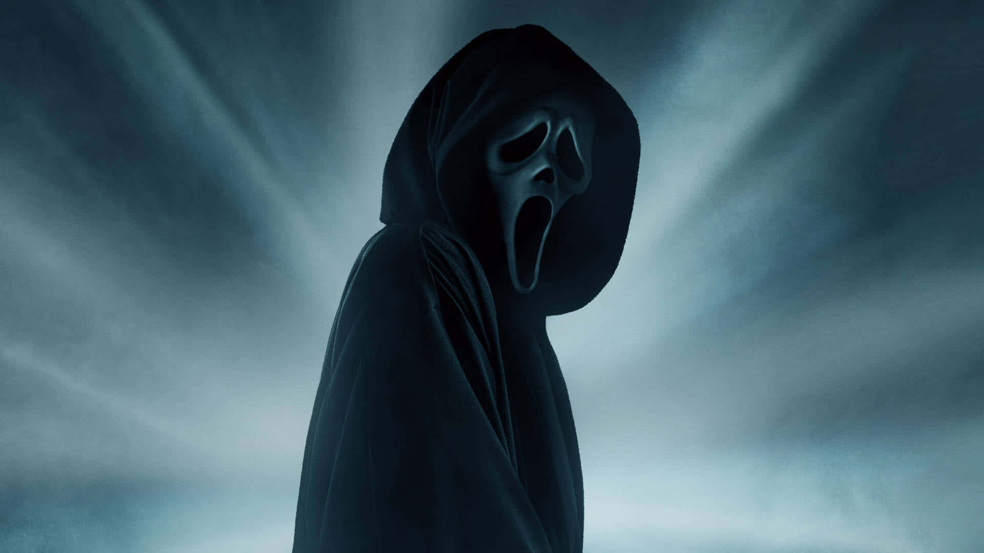 Scream Movie Poster With A Hooded Man In The Background
