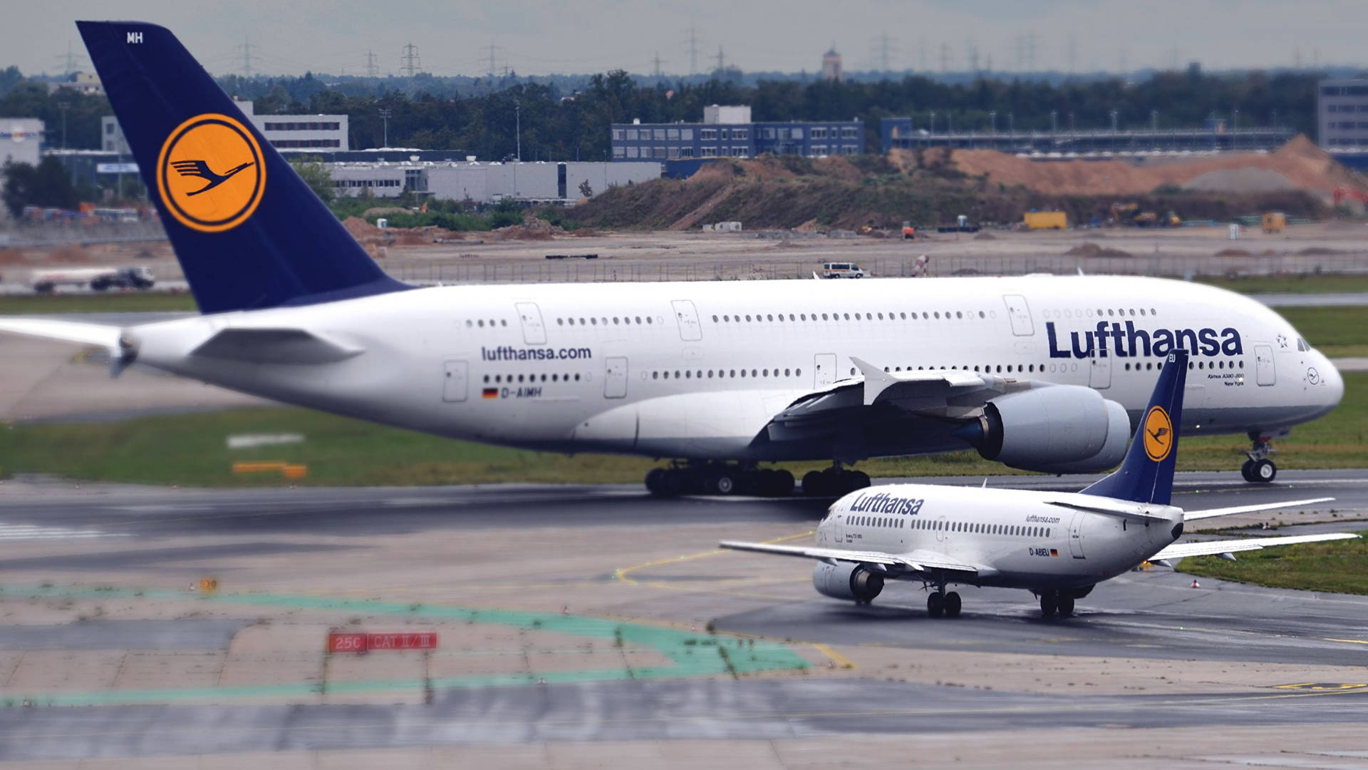 Giant And Mini Deutsche Lufthansa Airplanes Picture