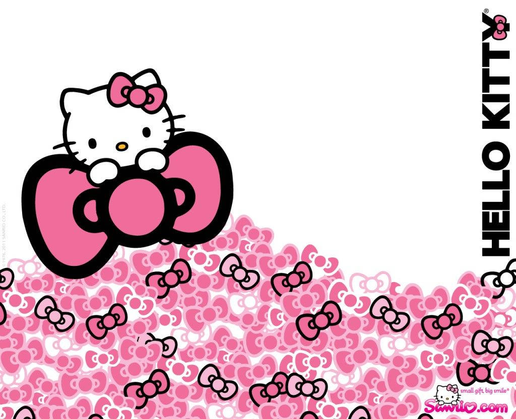 Hello Kitty with a Giant Pink Ribbon Wallpaper