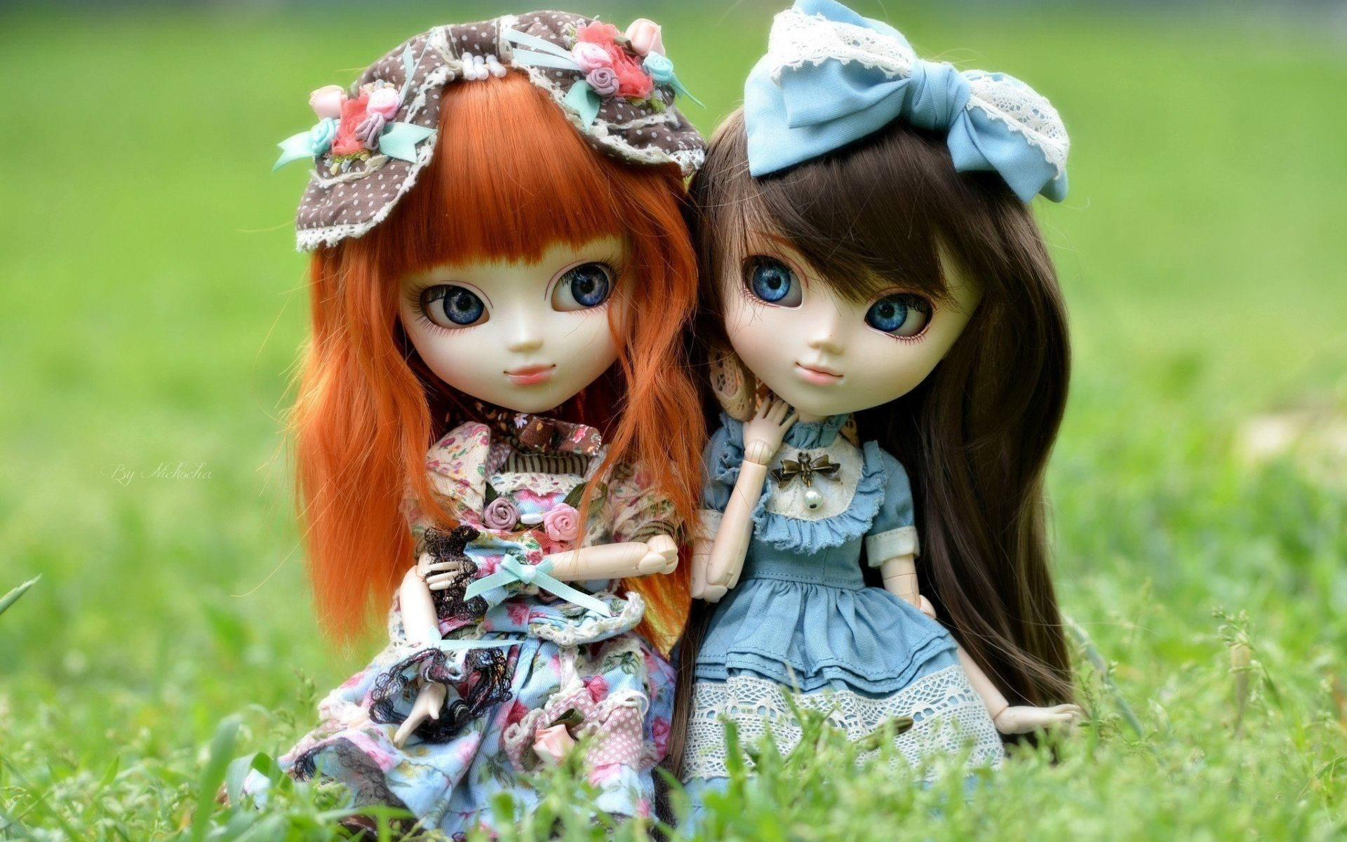 Enchanting Pair: Ginger and Brunette Cute Dolls Wallpaper