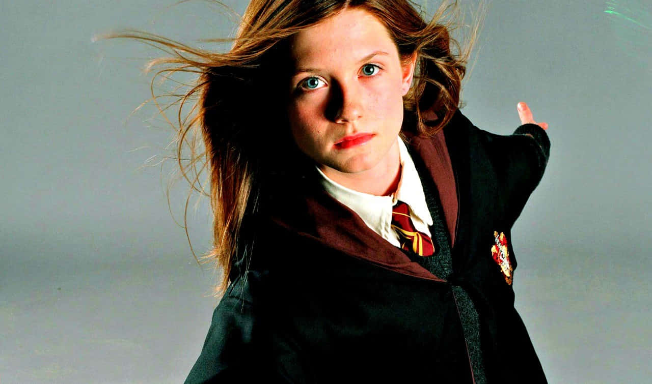 Ginny Weasley in action at the Battle of Hogwarts Wallpaper