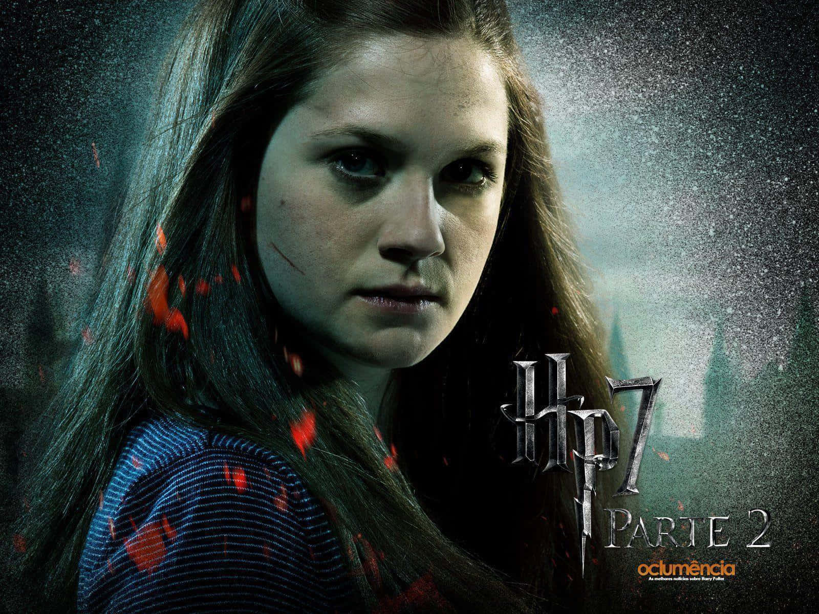Ginny Weasley striking a pose in her Gryffindor Quidditch robes Wallpaper