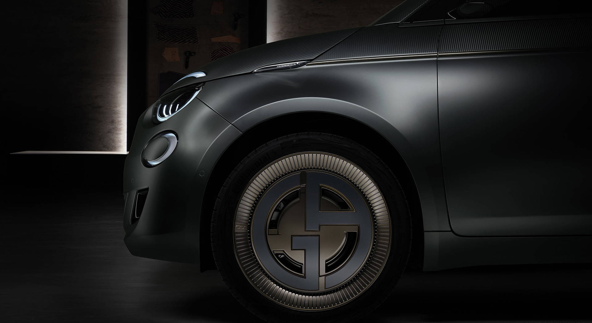 Giorgio Armani Logo On Car Wheel Wallpaper