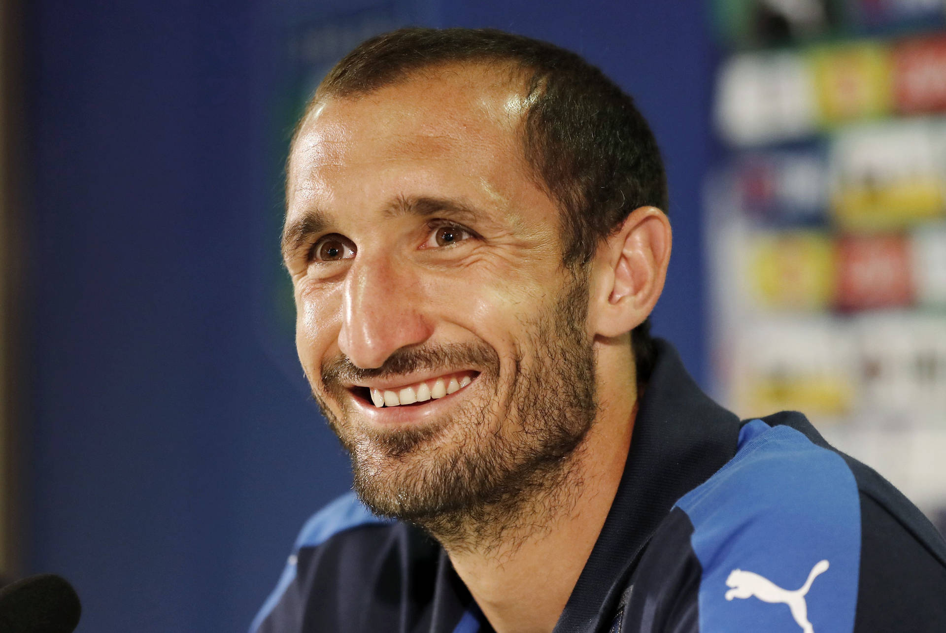 Giorgiochiellini, Jugador Italiano De Fútbol, Sonríe. Fondo de pantalla