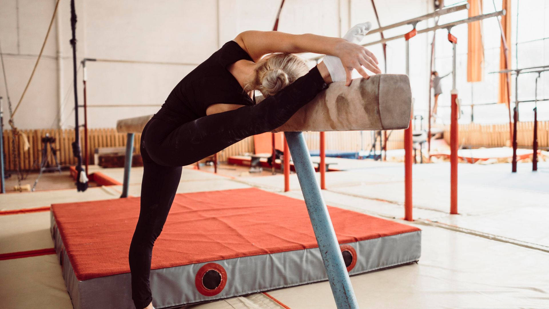 Girl Acrobatic Balance Beam Wallpaper