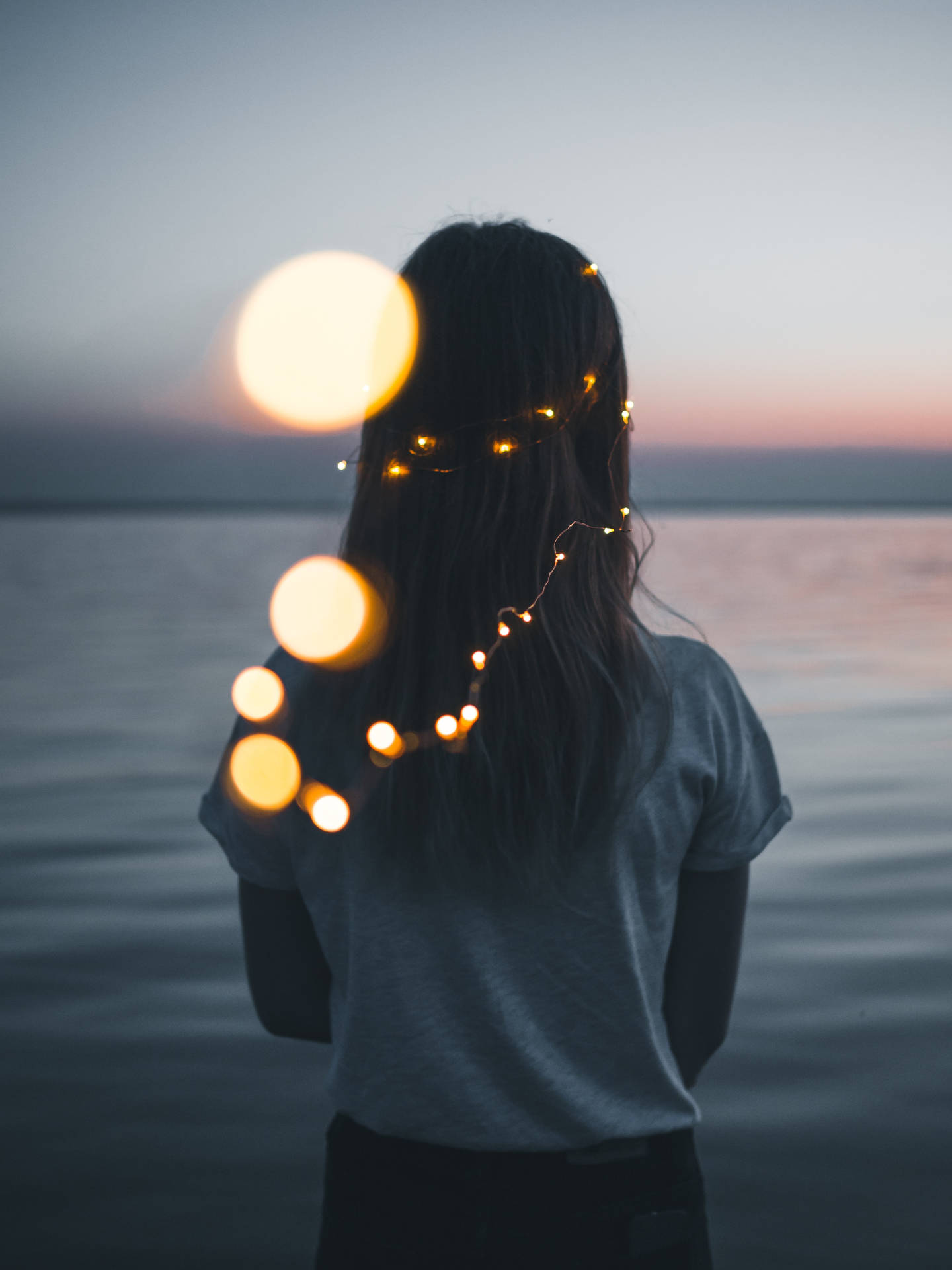 Girl Aesthetic In Beach With Fairy Lights Background