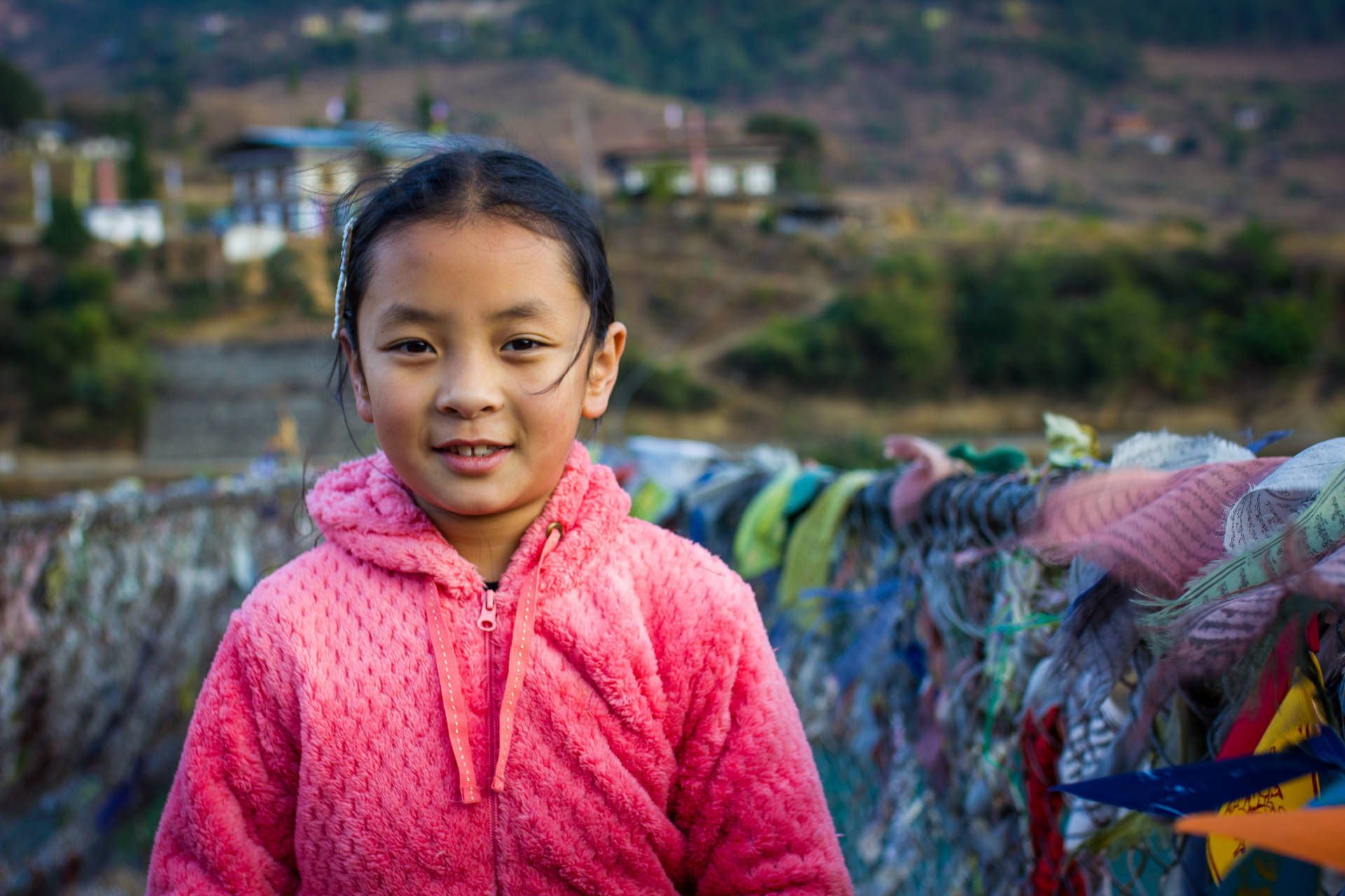 Girl At Bhutan Suspension Bridge Wallpaper