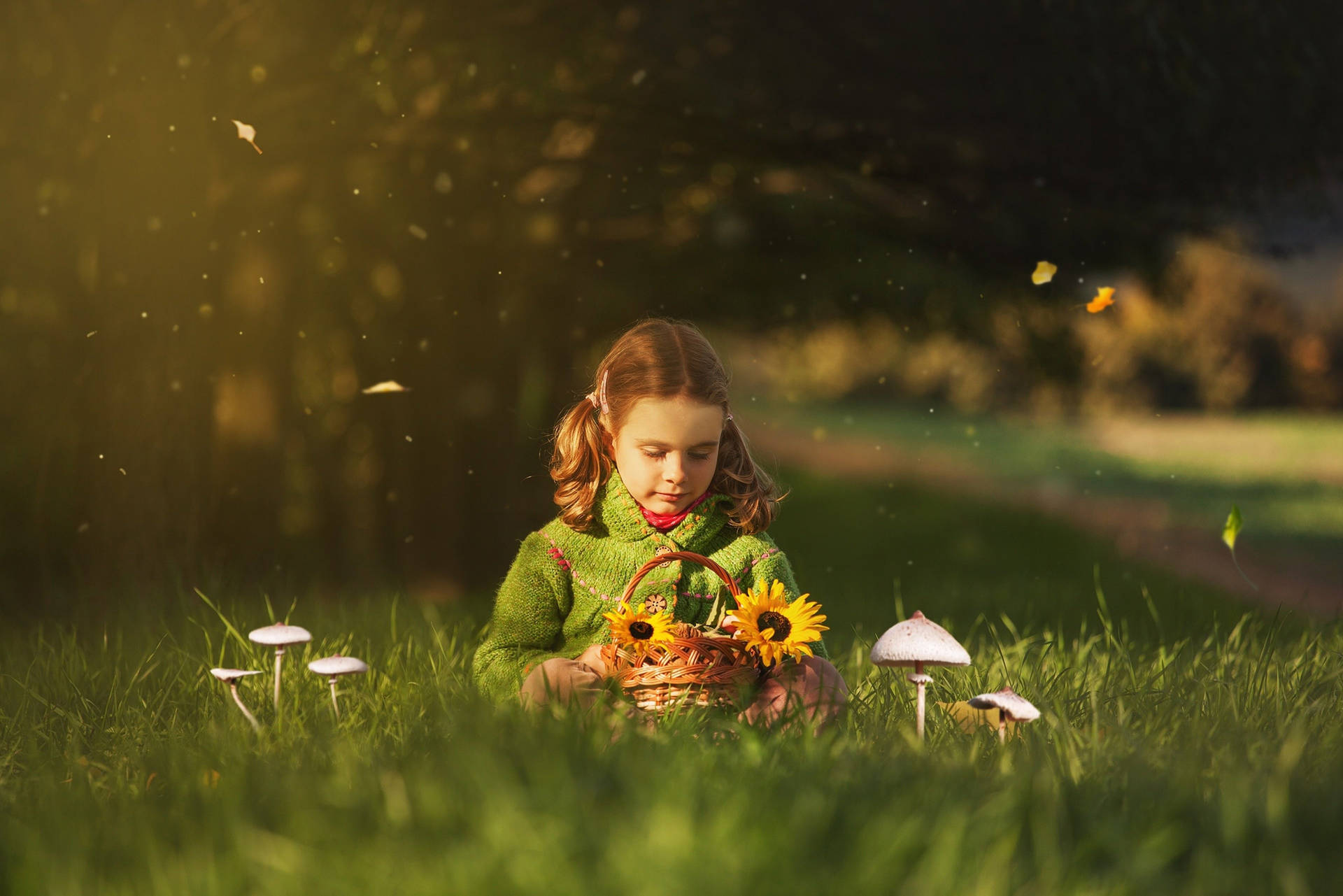 Girl Child Holding Sunflowers In Spring Wallpaper