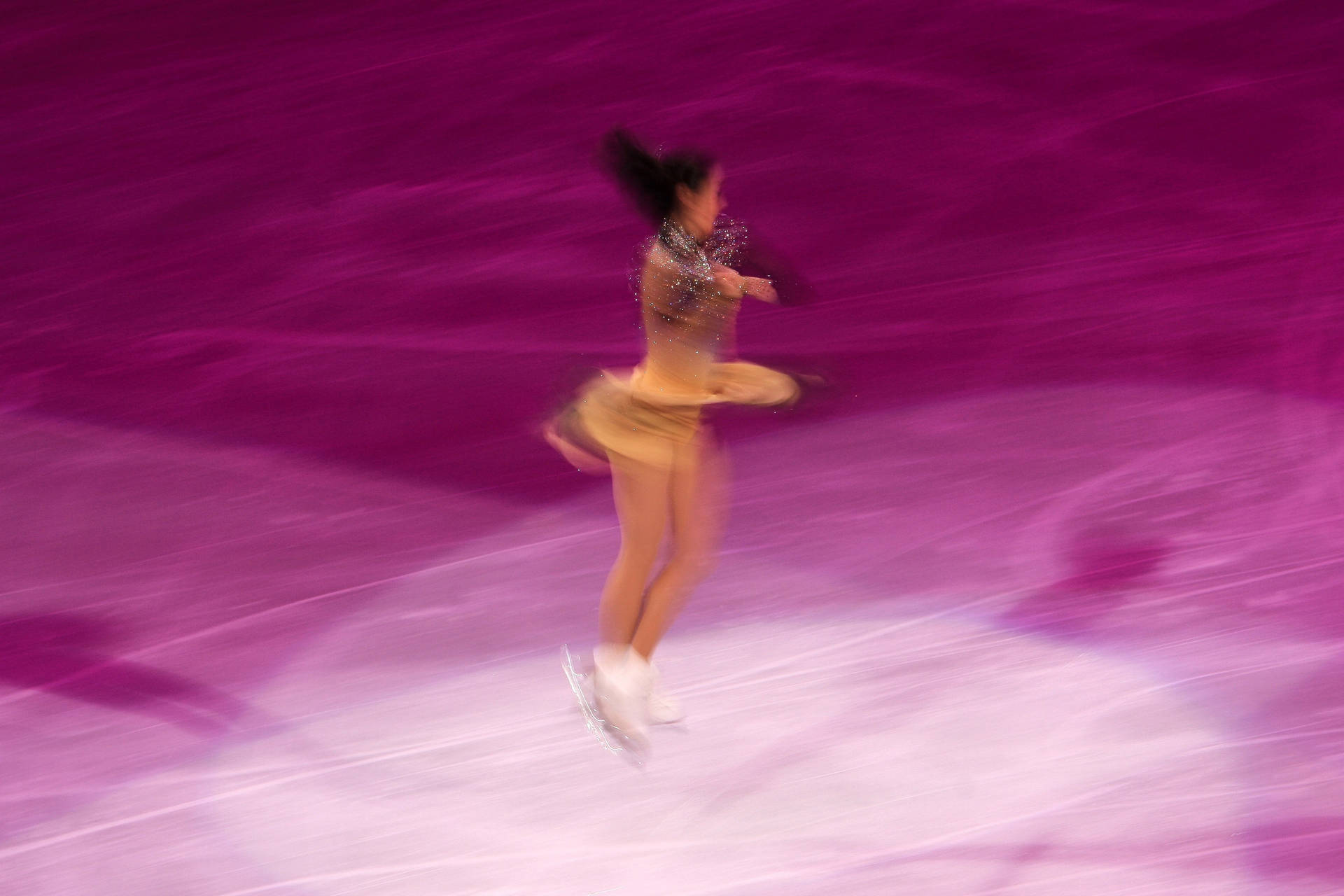 Girl Ice Skating In Exquisite Movement Background
