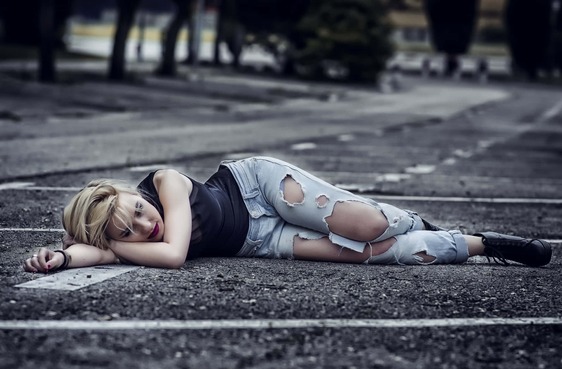 Girl In Jeans Laying On Road Pictures