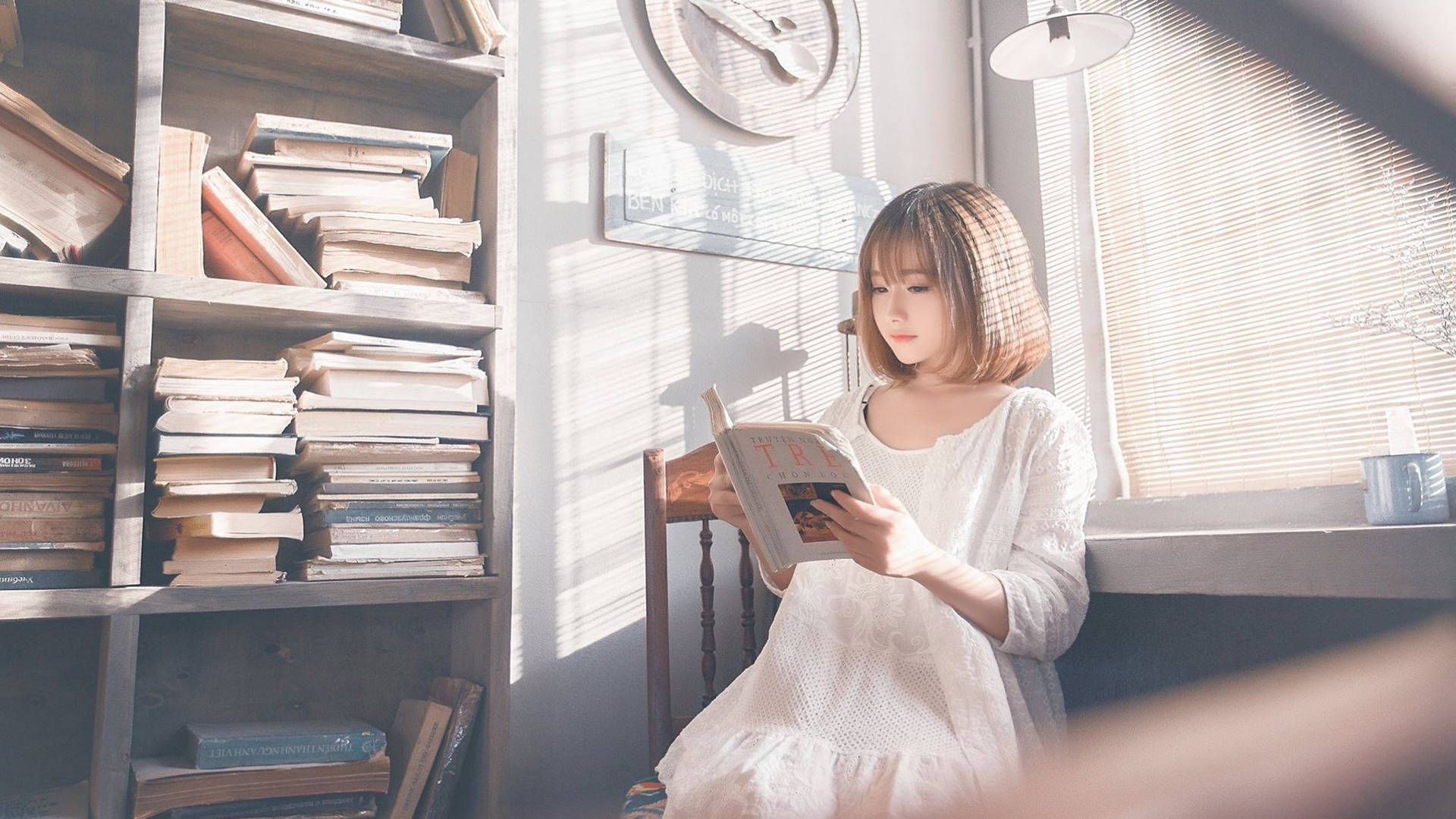Girl In White Reading Book Wallpaper