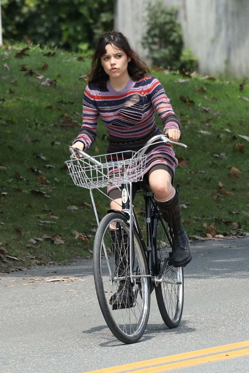 Girl Riding Bikein Striped Dress Wallpaper