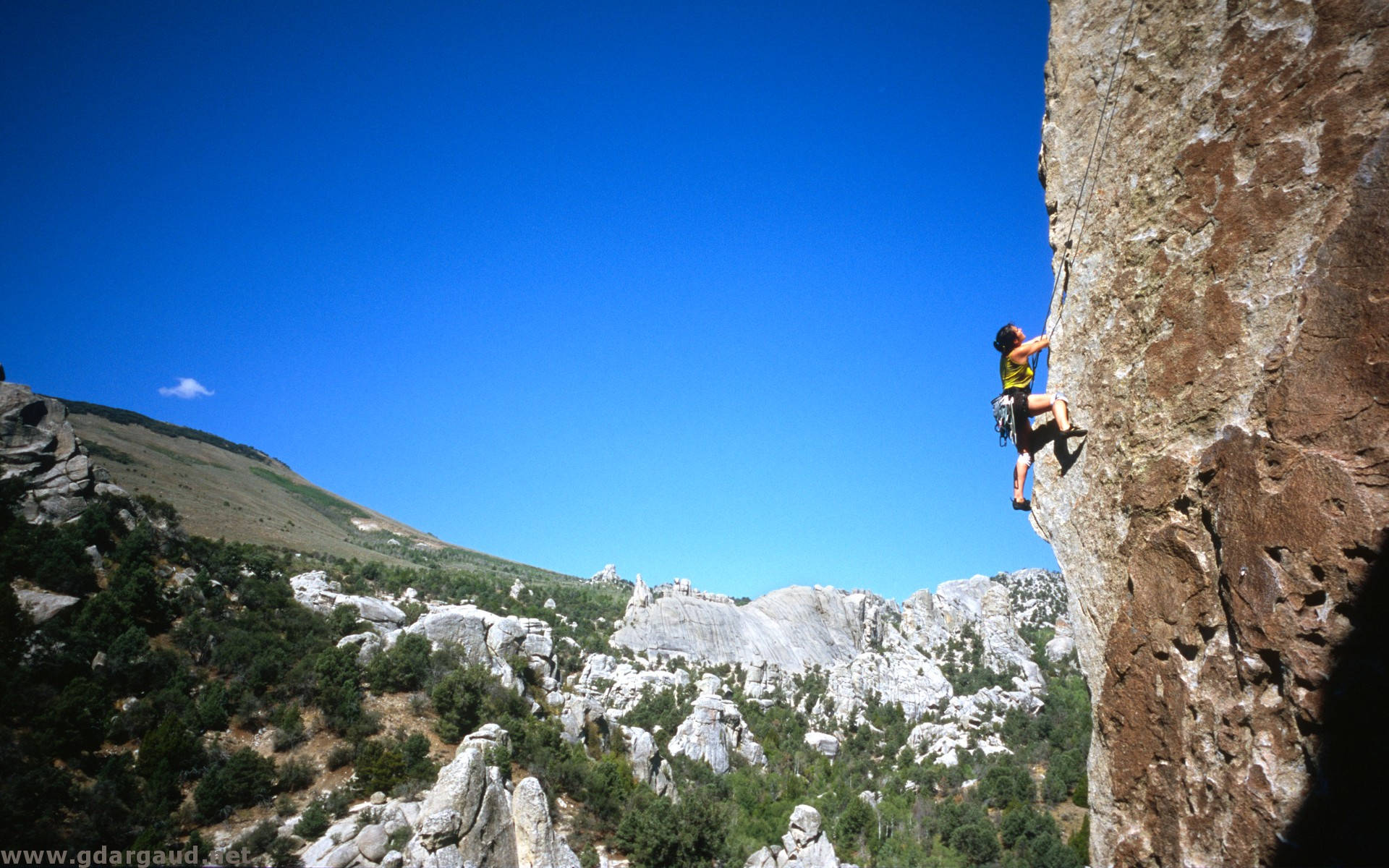 Girl Rock Climbing Over Rocky Mountain Wallpaper