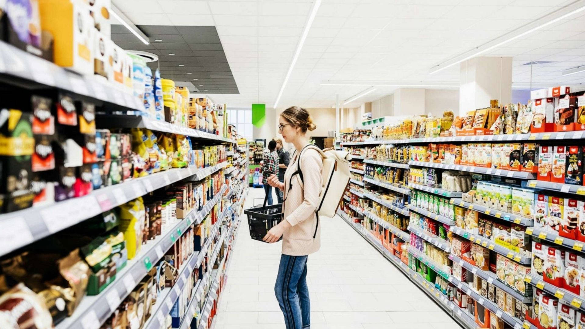 Girl Shopping In Grocery Store Wallpaper