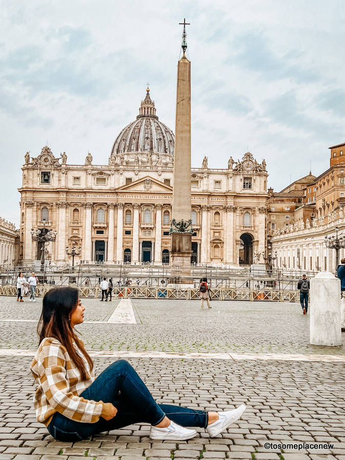 Girl Sitting In Vatican City Wallpaper