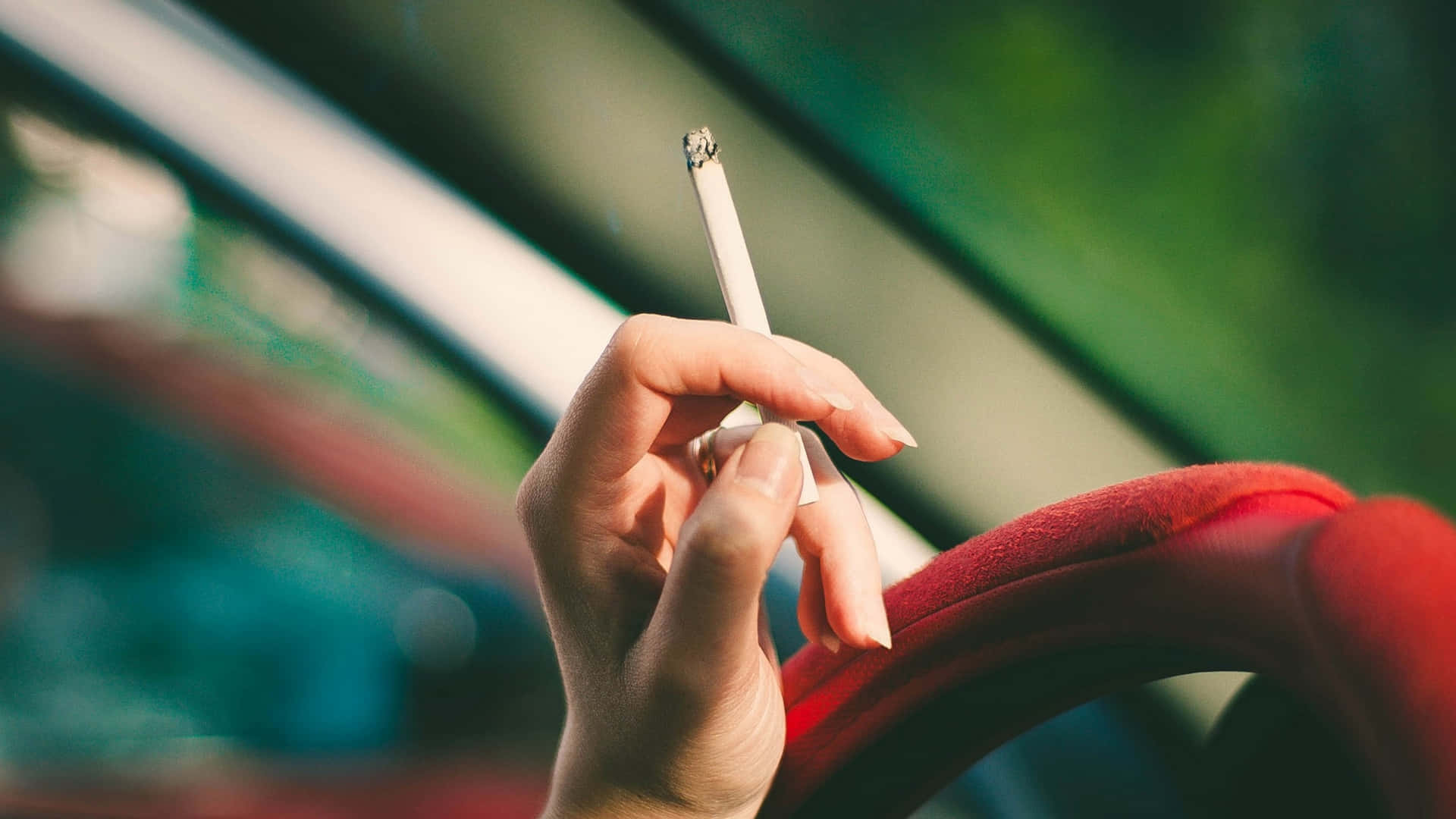 Girl Smoking In A Car Wallpaper