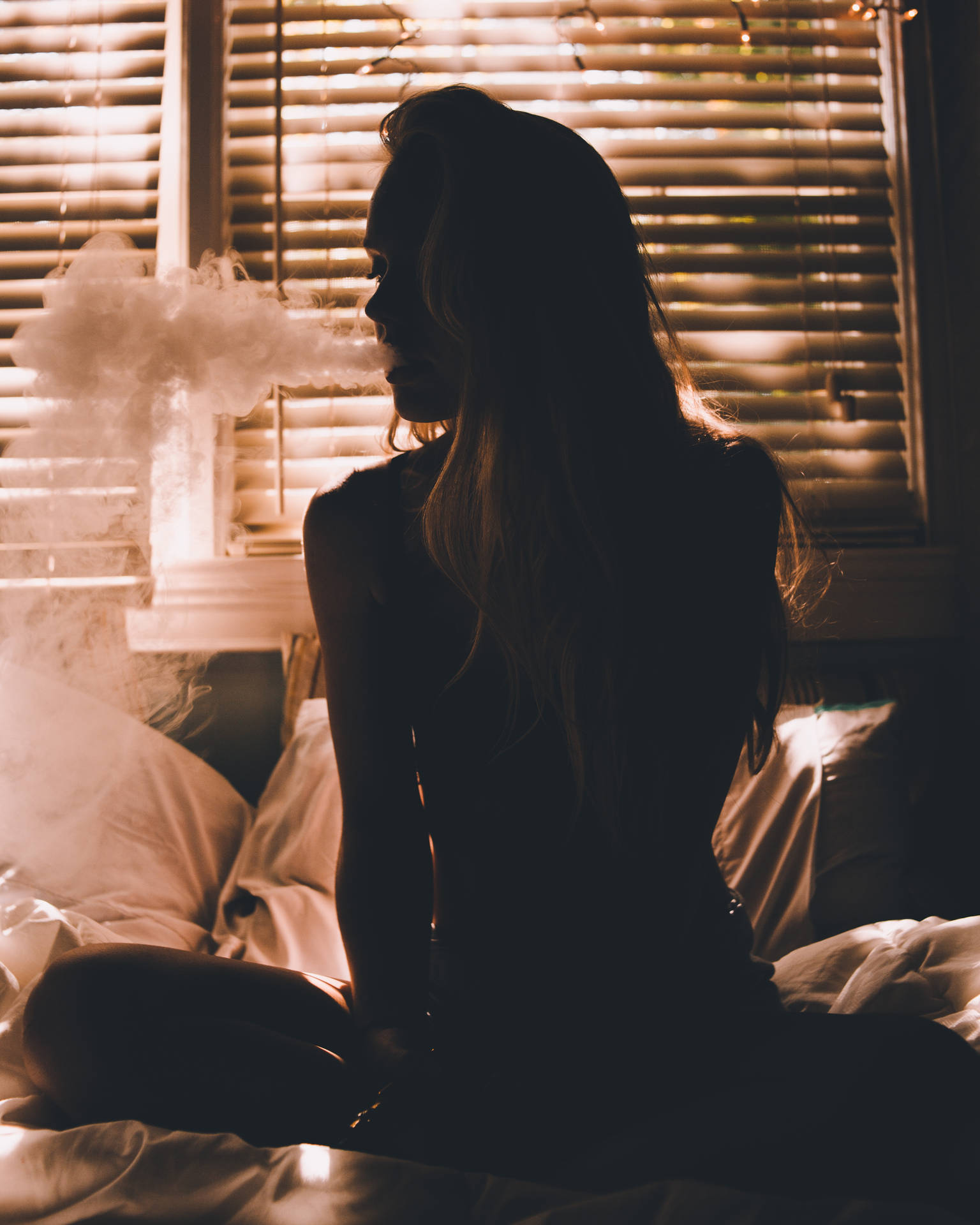 Girl Smoking On Bed Wallpaper