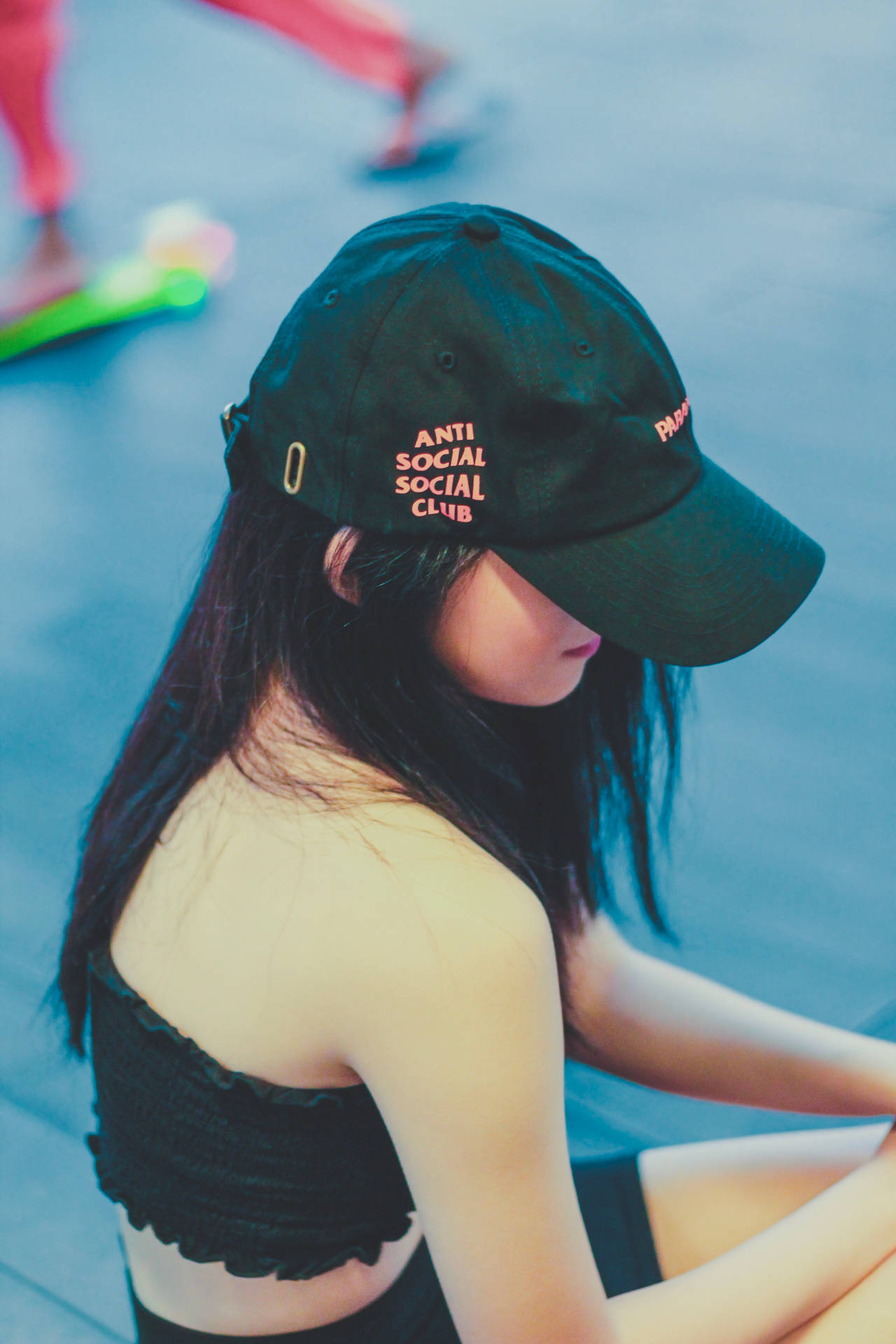 Girl Wearing Anti Social Social Club Cap Wallpaper