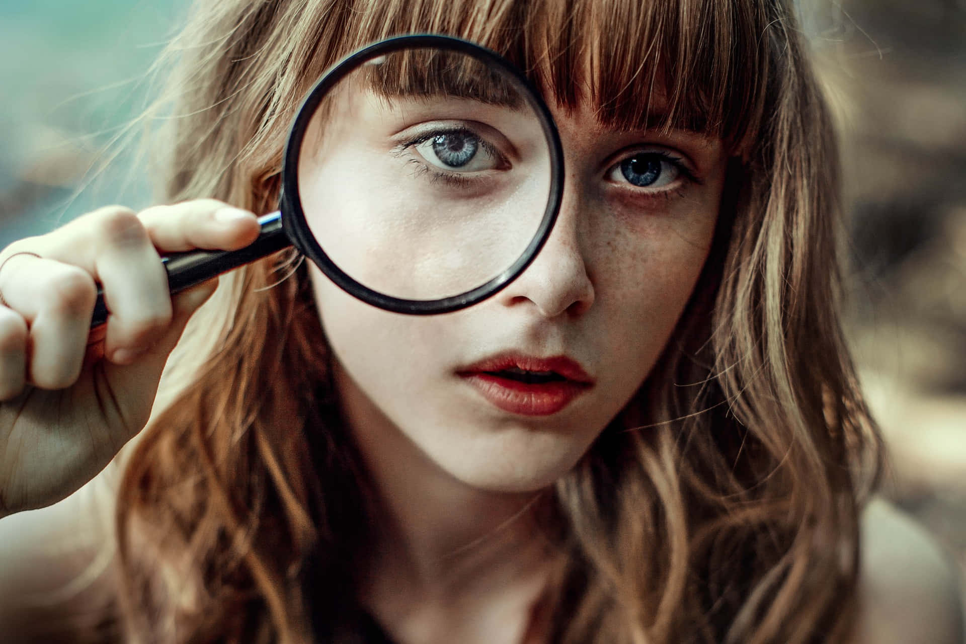 Girl With A Magnifying Glass Wallpaper