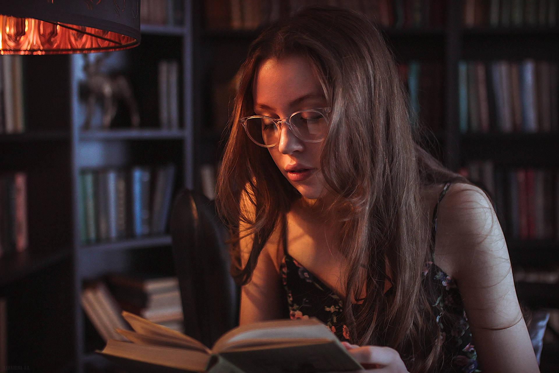Girl With Eyeglasses Reading Book Wallpaper