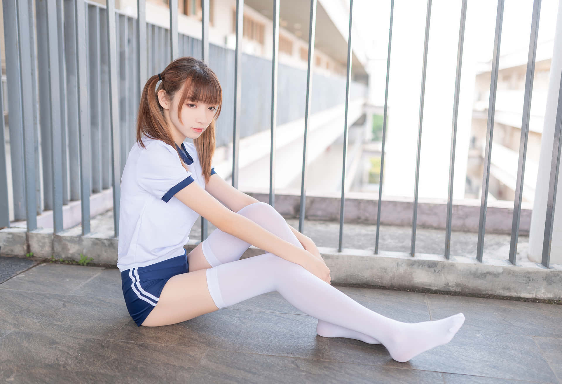 Girl With Pigtails Wearing Thigh Highs Wallpaper