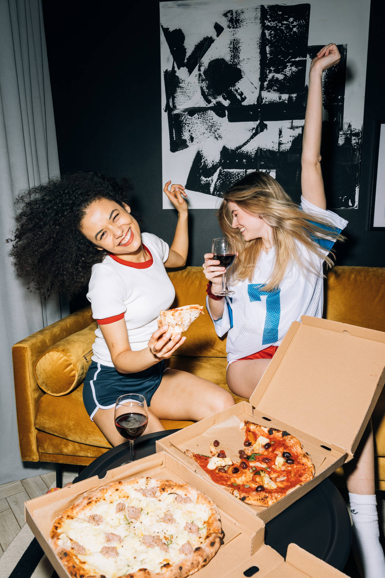 Girls Having Fun Eating Dominos Pizza Wallpaper