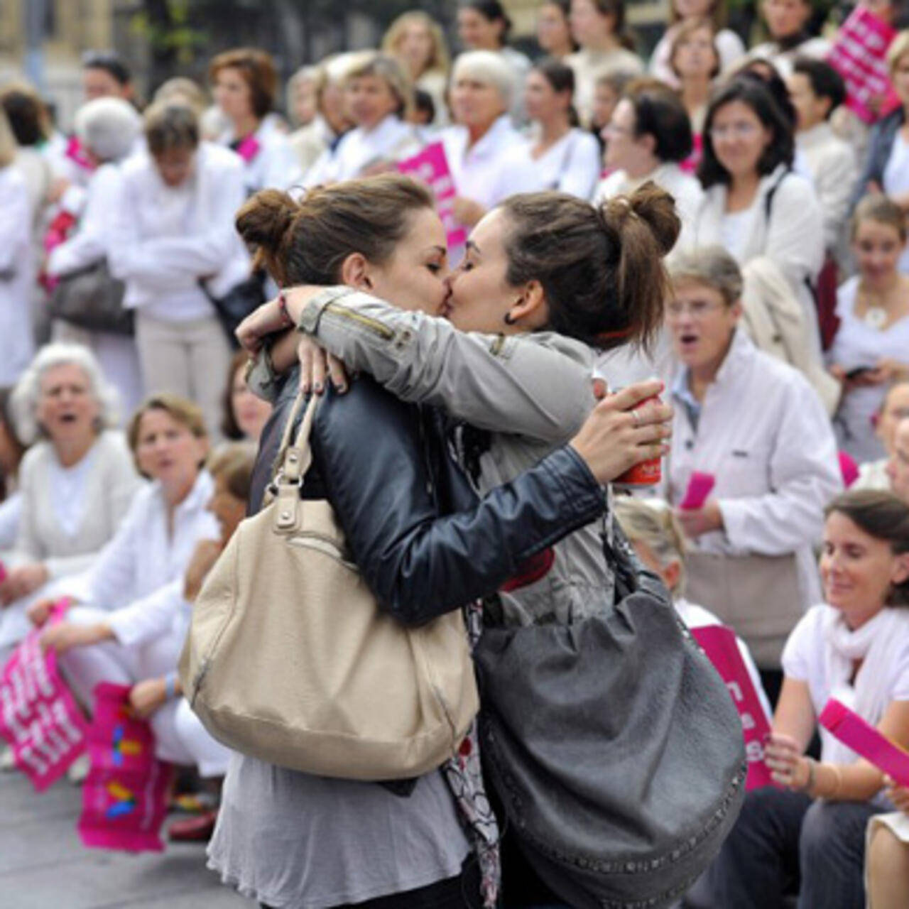 Girls Kissing At Protest Wallpaper