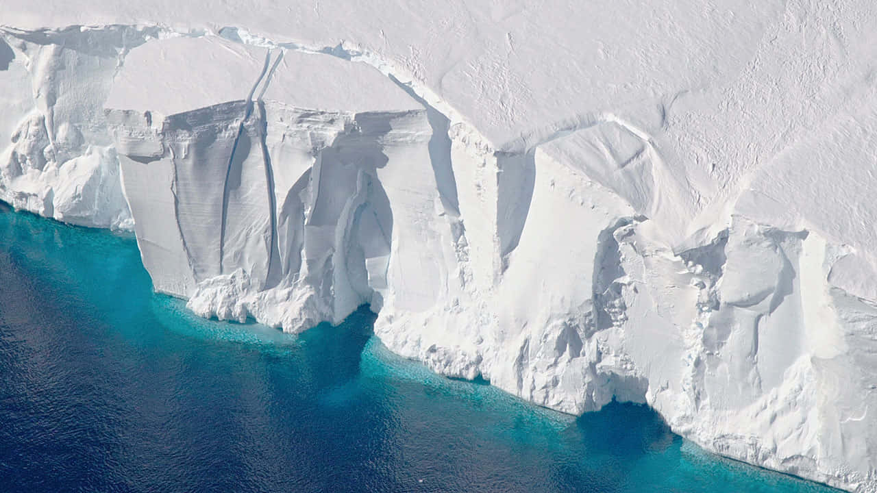 Glacial_ Ice_ Cliff_ Aerial_ View.jpg Wallpaper