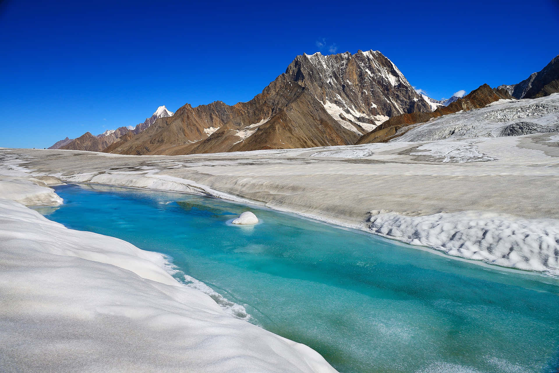 Glacial_ Landscape_with_ Meltwater_ Stream.jpg Wallpaper