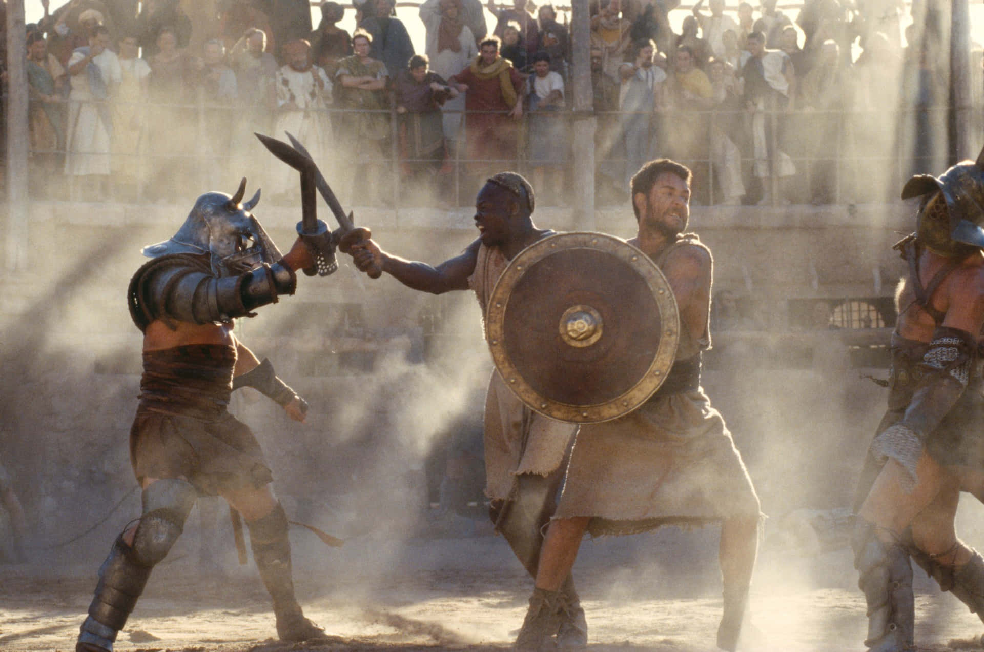 A Group Of Men In Armor Fighting In A Stadium