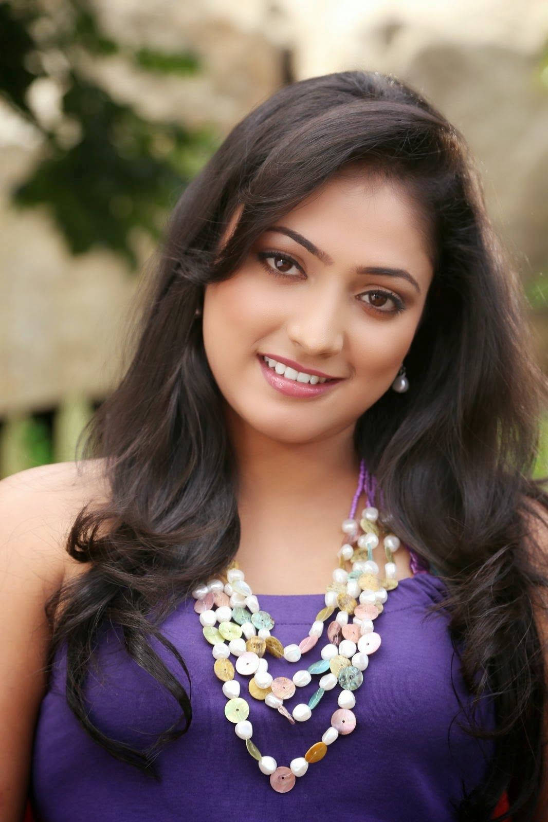 Glamorous Purple Telugu Heroines Background