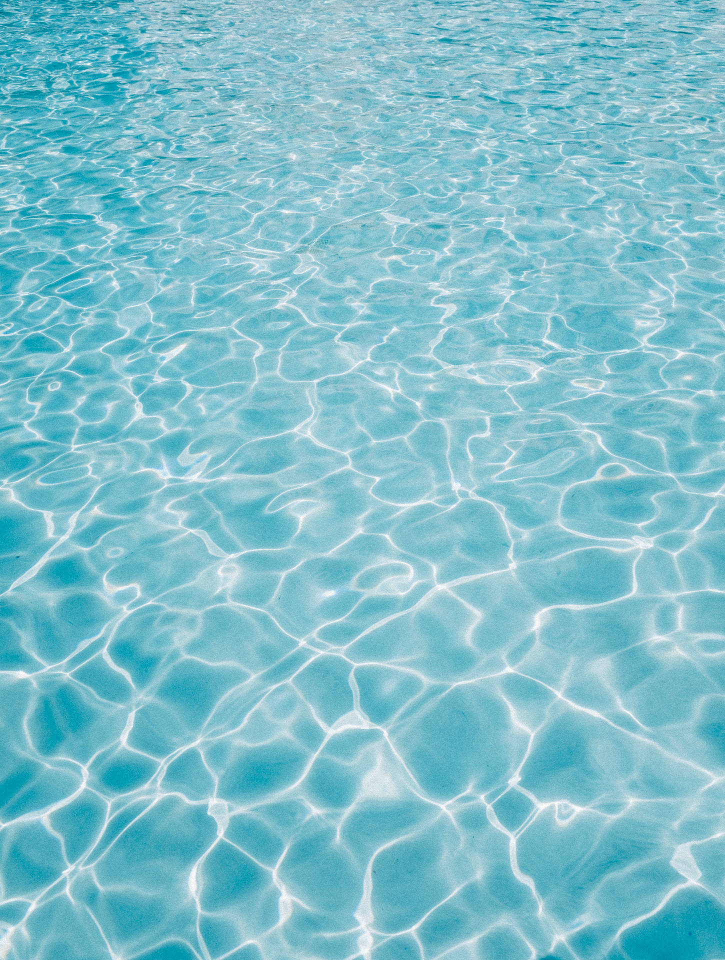 Refreshing Glare of Pool Water Wallpaper