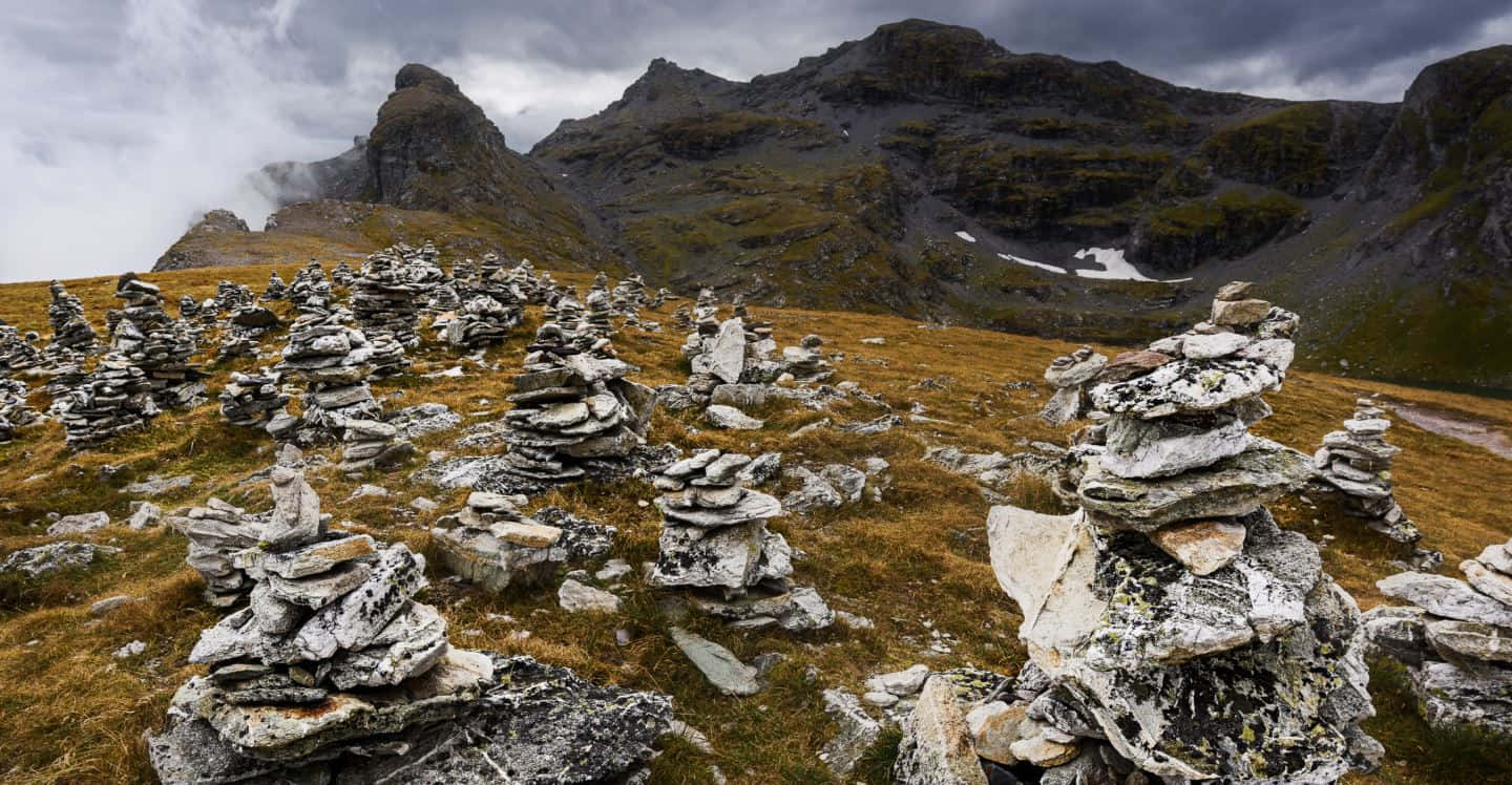 Glarus Stone Piles Mountain Landscape Wallpaper