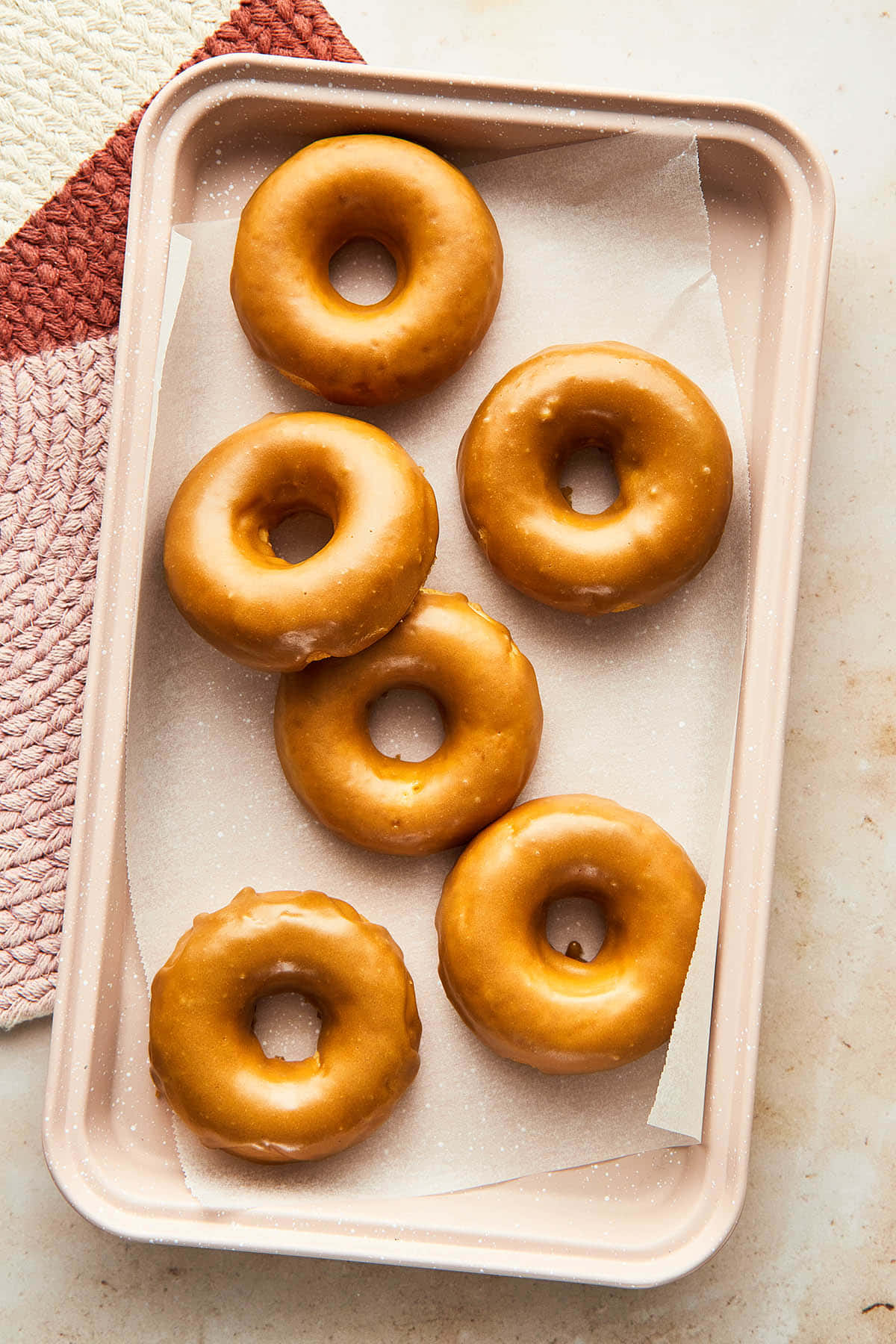 Tempt your taste buds with this delicious glazed donut Wallpaper