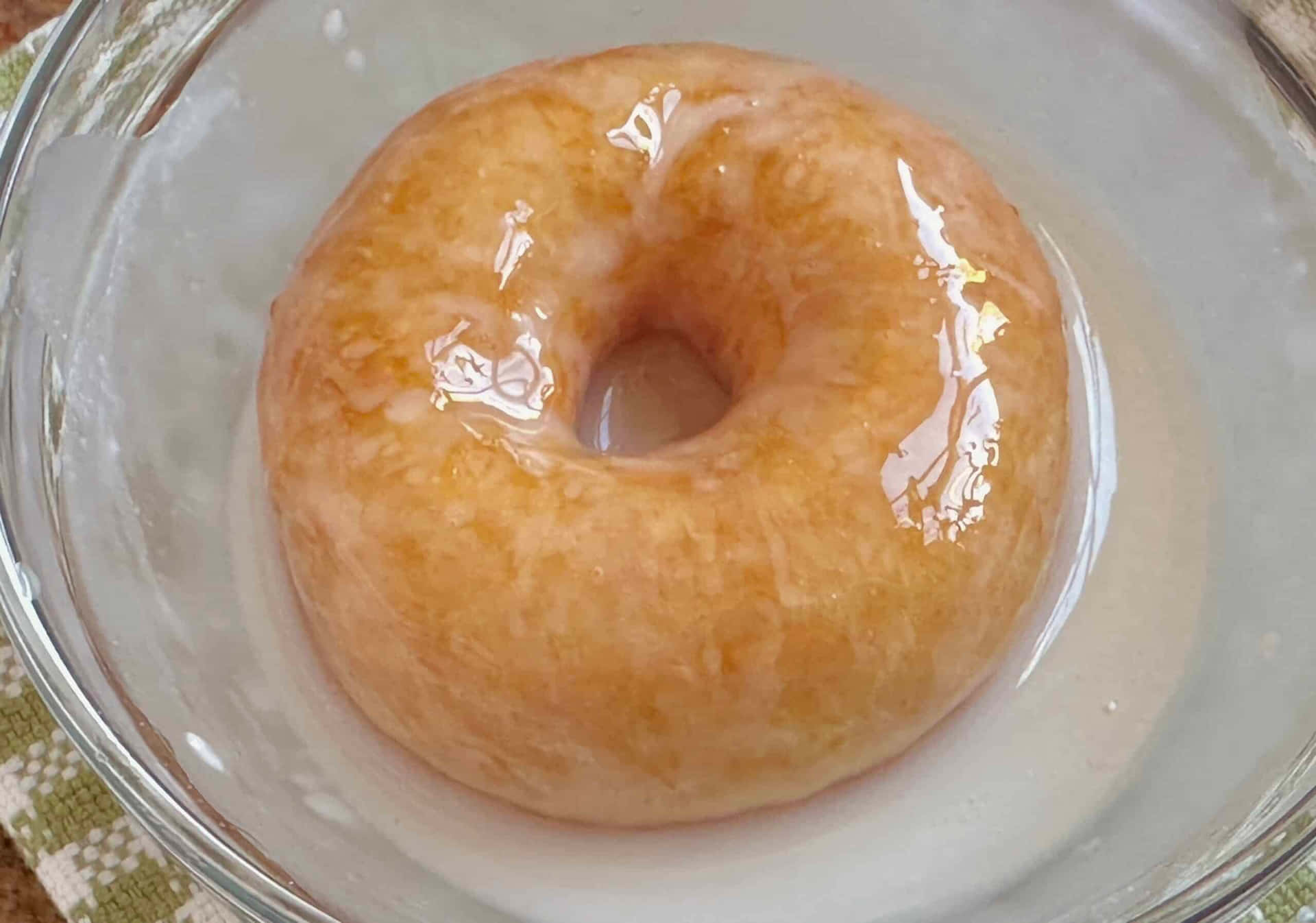 Nothing Satisfies Like a Freshly Glazed Donut Wallpaper