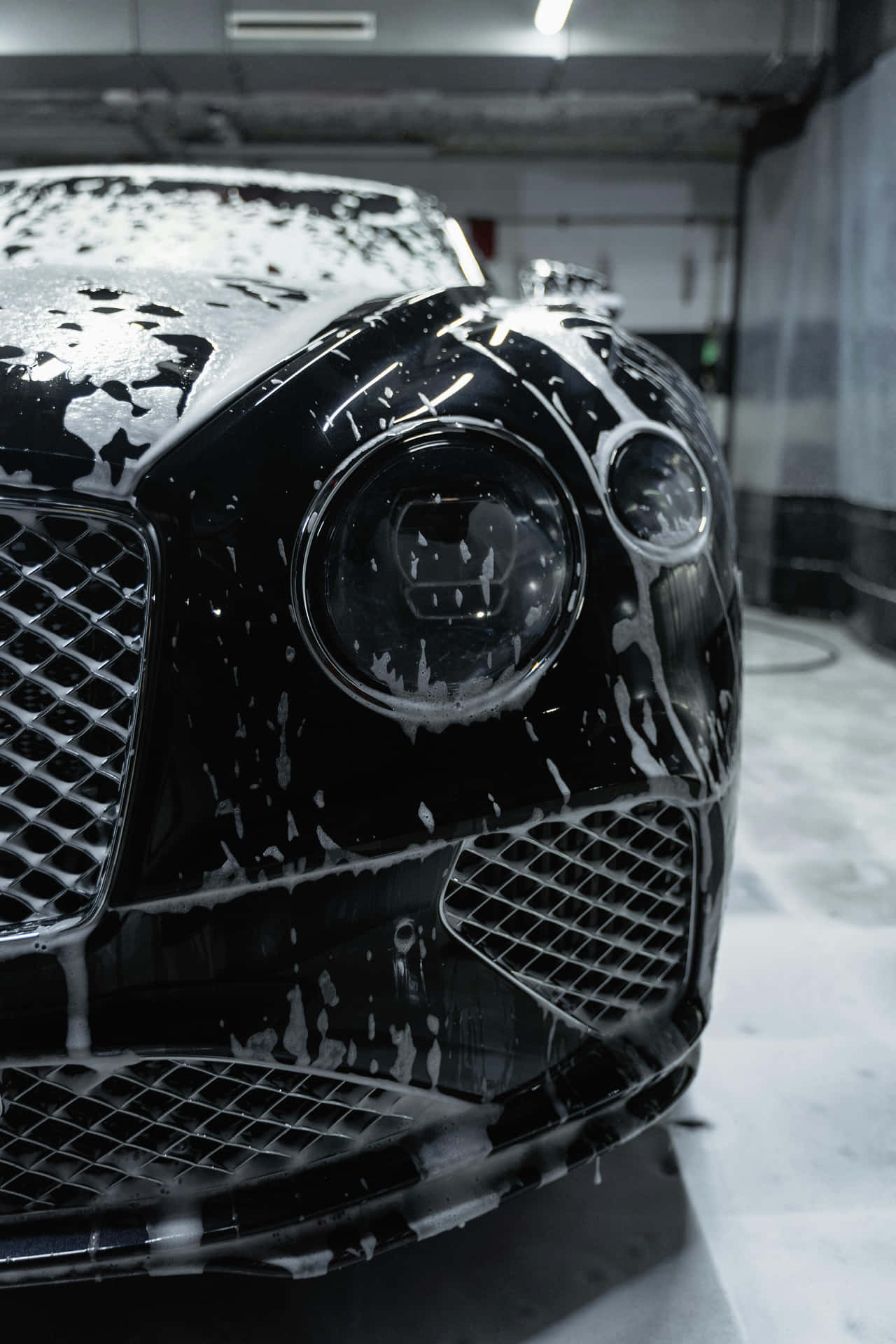 Gleaming_ Black_ Luxury_ Car_ Foam_ Wash.jpg Wallpaper