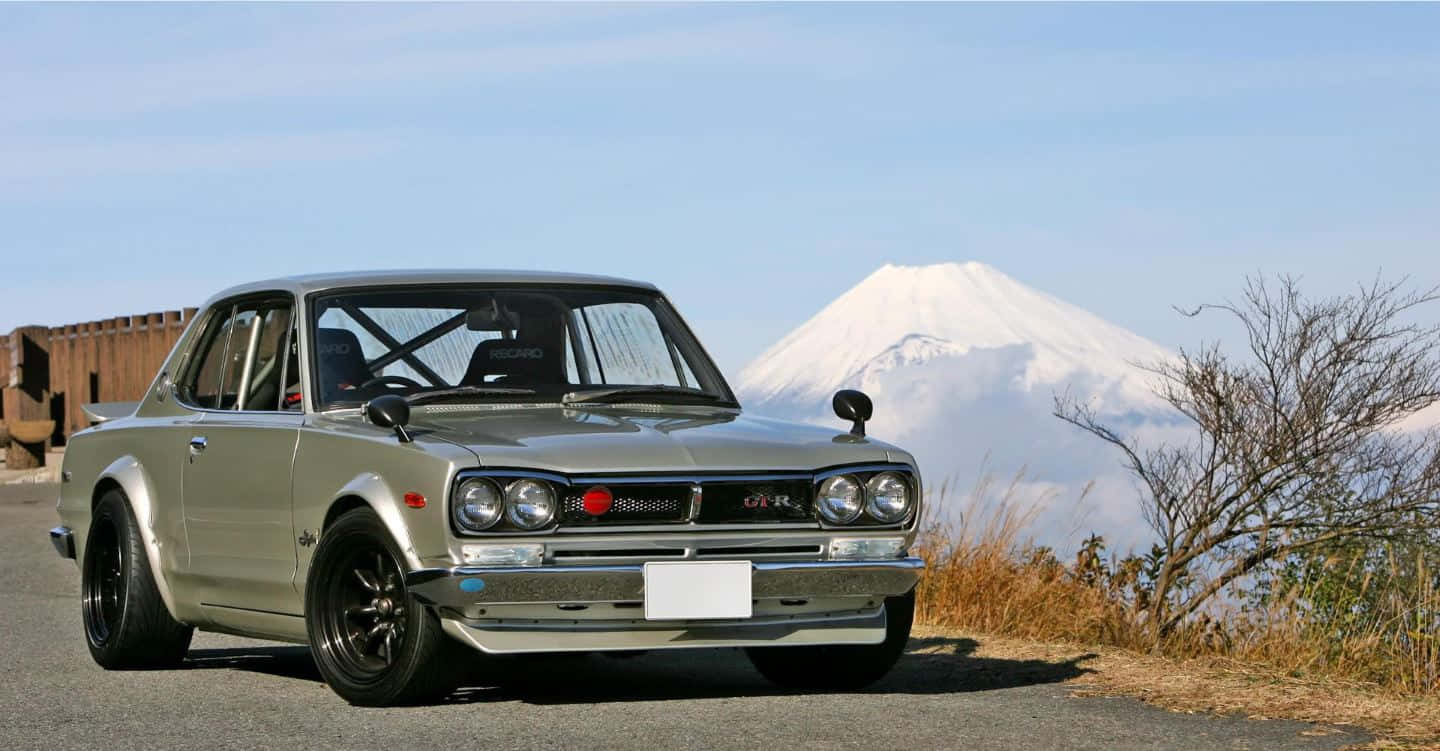 Gleaming Datsun 510 - Beauty Infused With Power Wallpaper