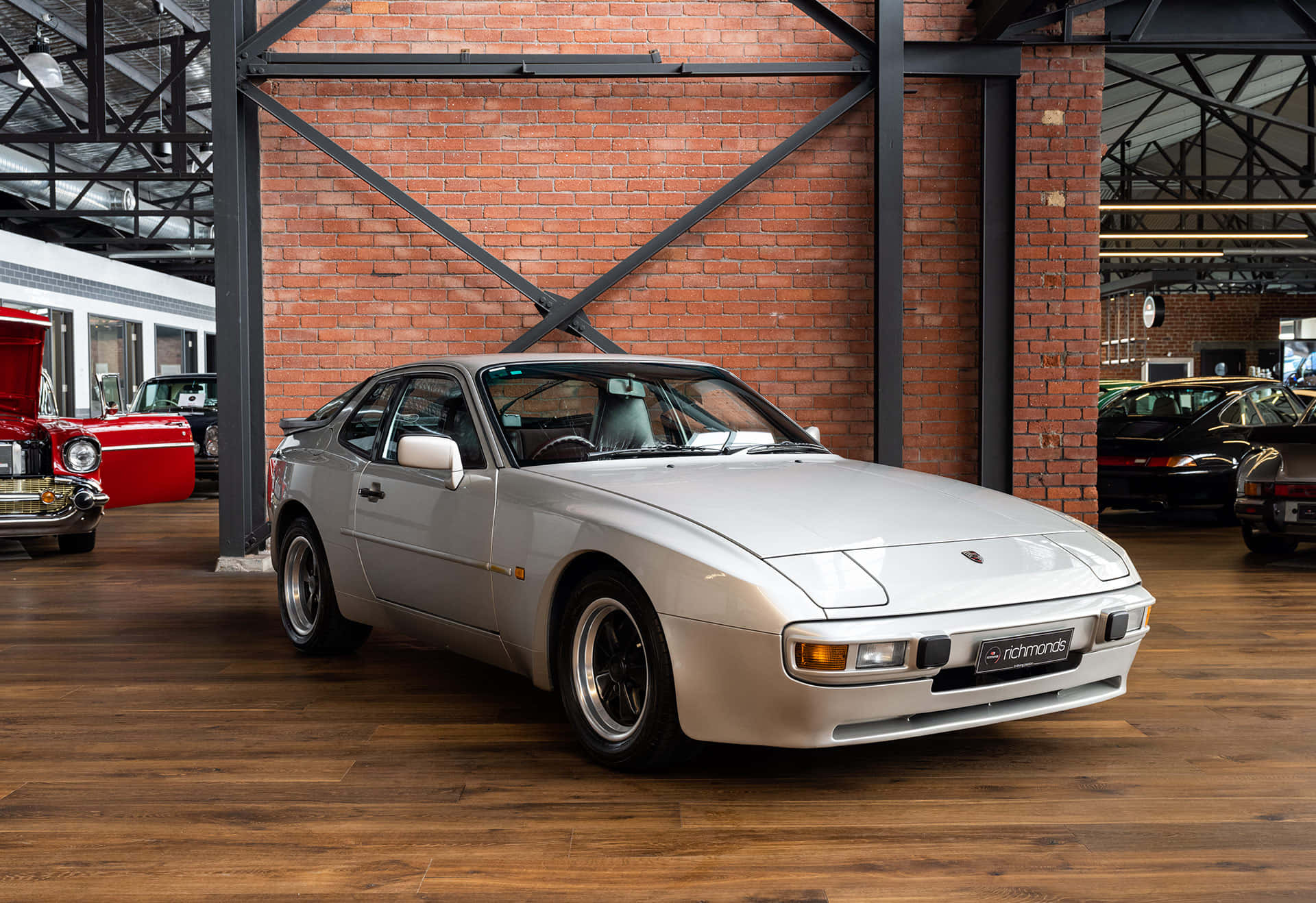 Gleaming Red Porsche 944 In Stunning Detail Wallpaper