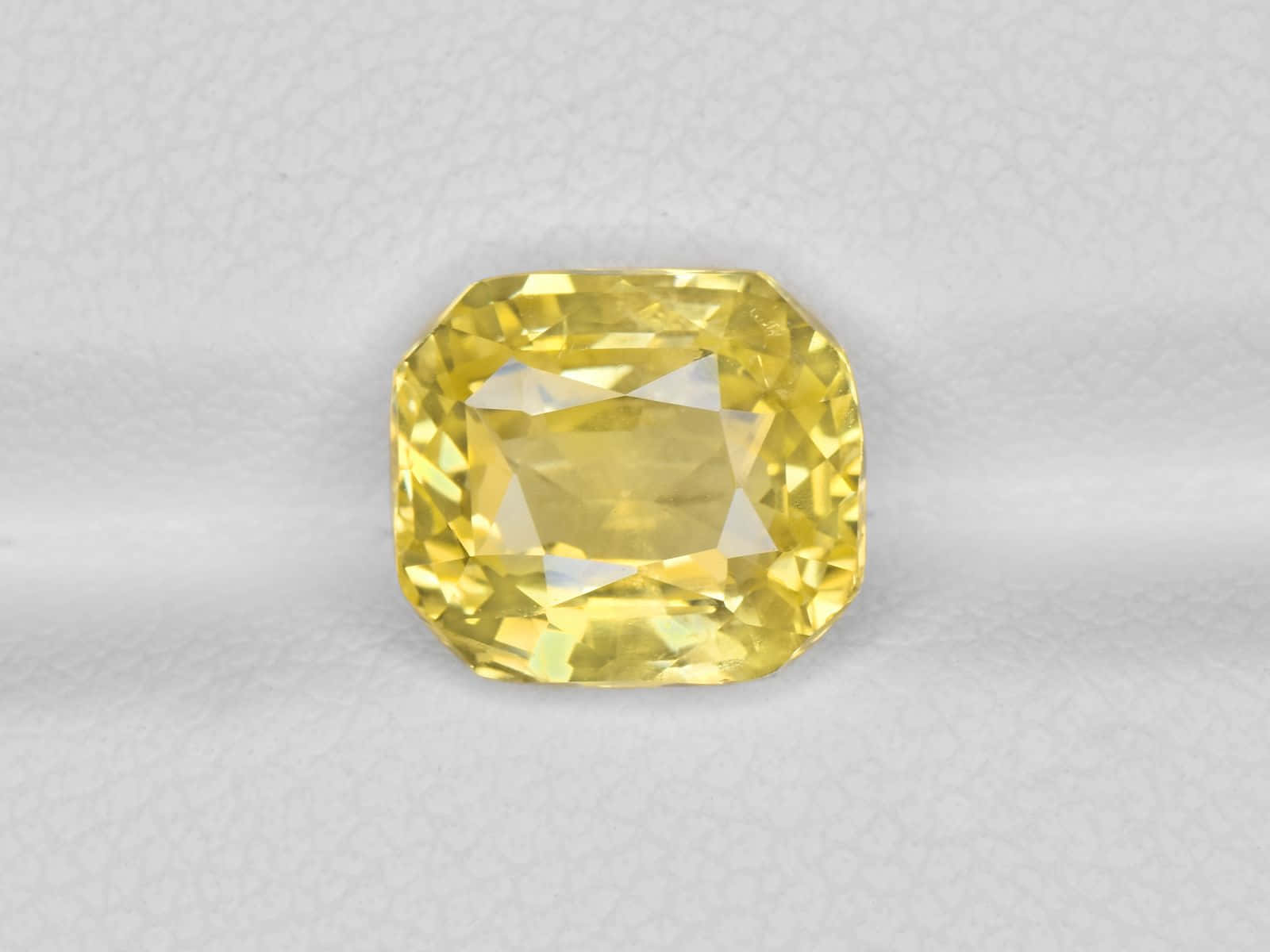 Gleaming Yellow Sapphire - A Symbol Of Prosperity Wallpaper
