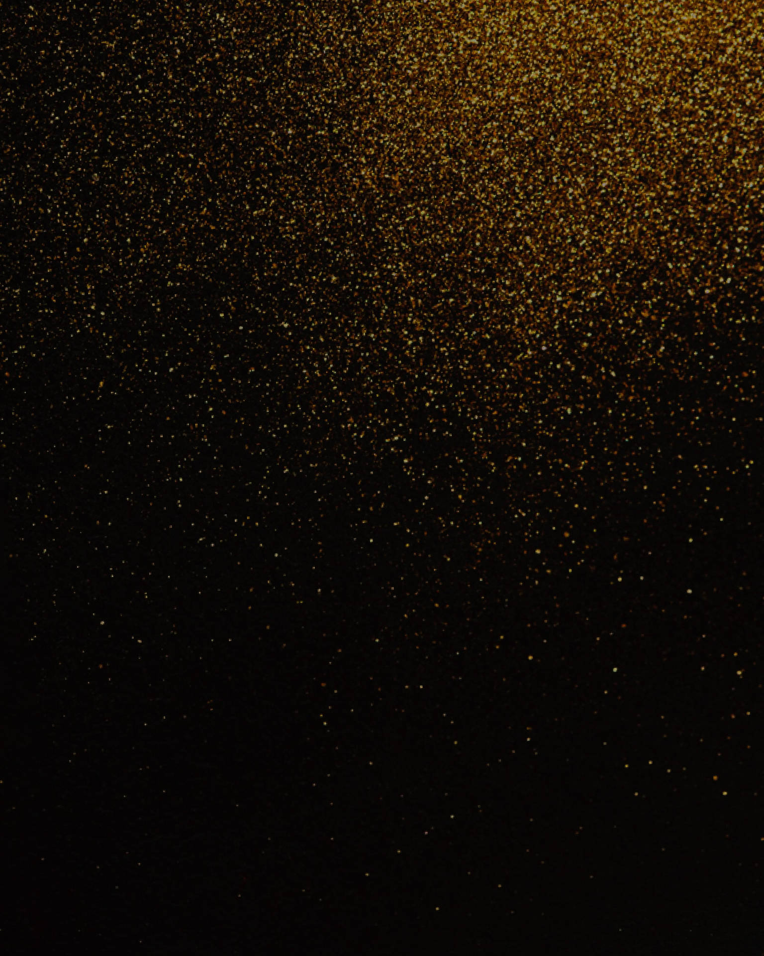 A Black Background With Gold Glitter Wallpaper