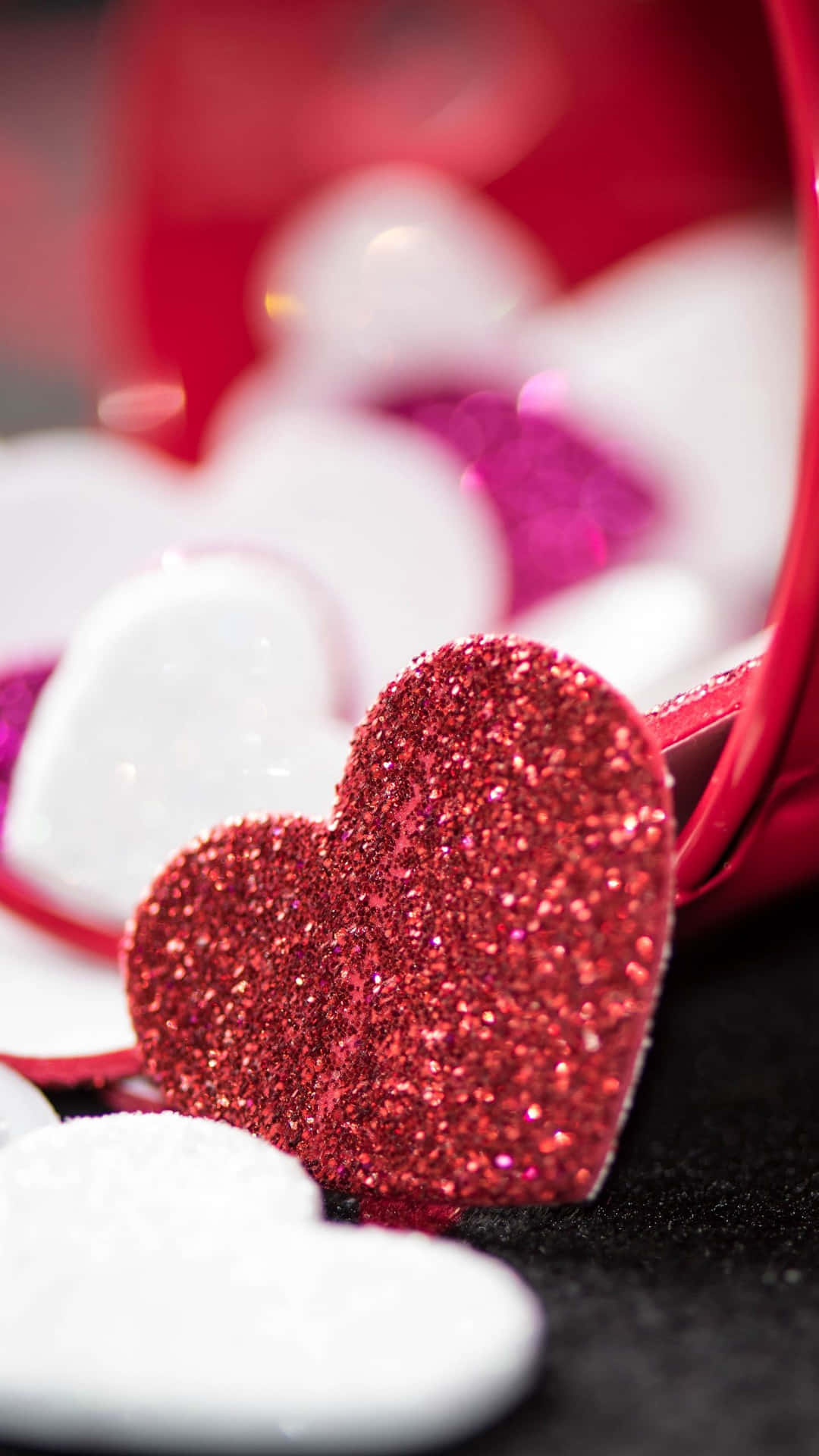 Spread love with these sparkly pink hearts Wallpaper