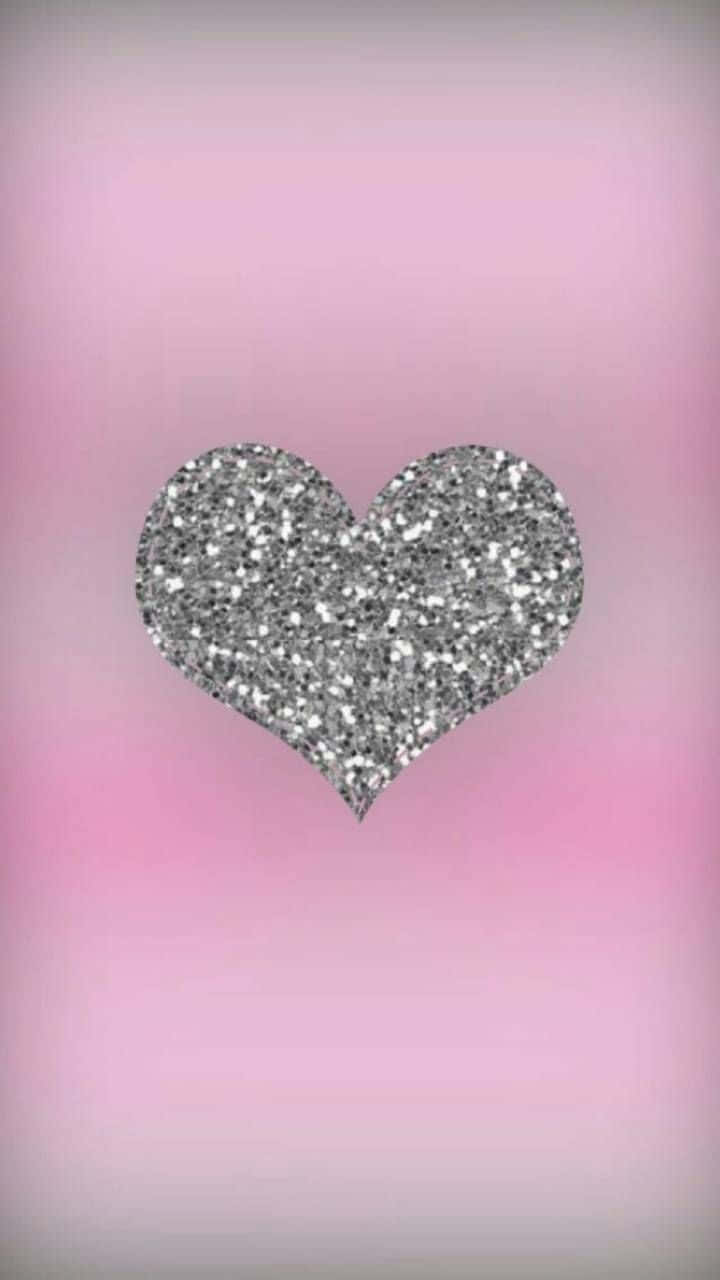 Celebrate love with these sparkly pink hearts Wallpaper